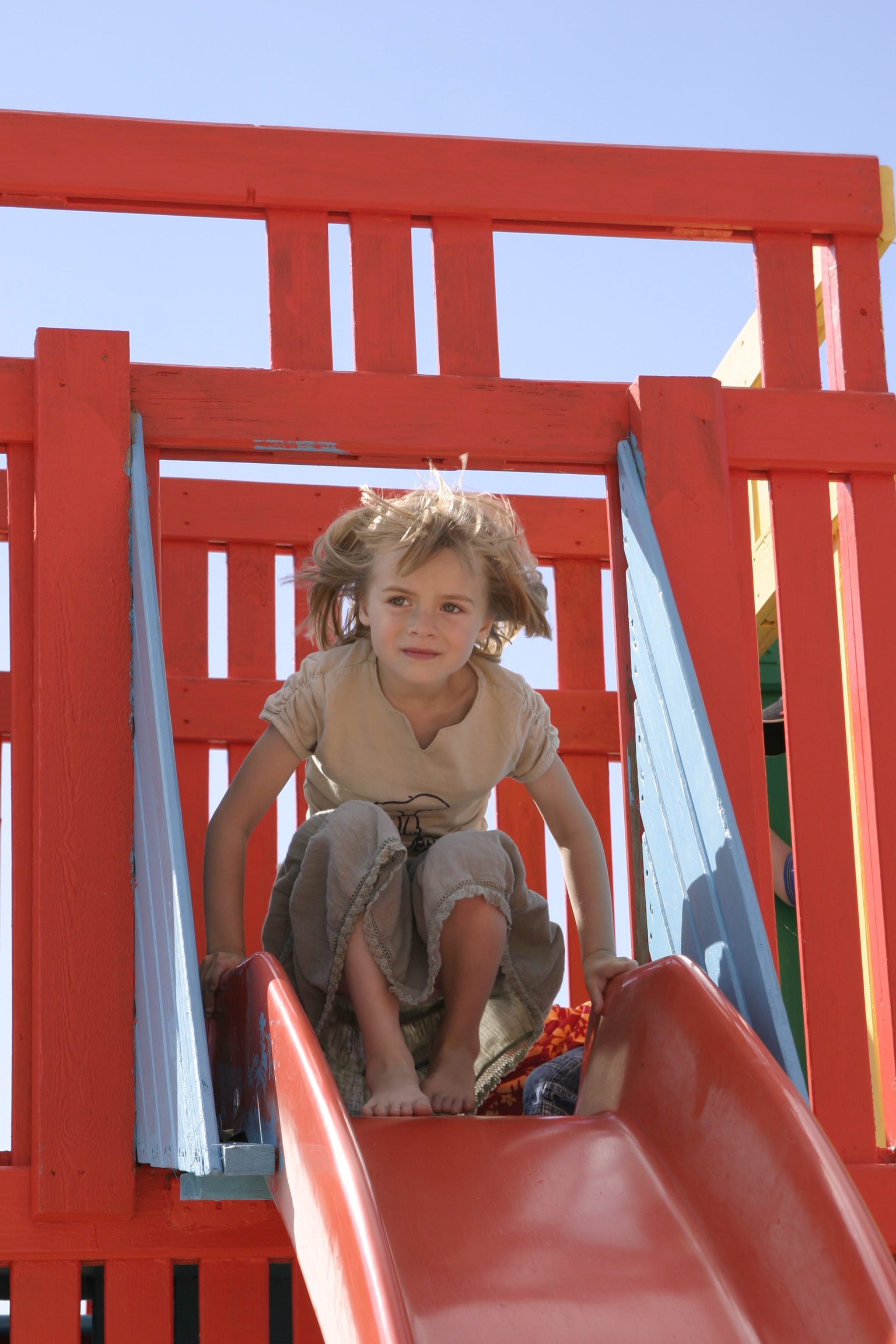 one person, childhood, summer, slide, males, front view, girl, child, innocence, lifestyles, portrait, outdoor play equipment, 2K, leisure activity, sitting, Phone HD Wallpaper