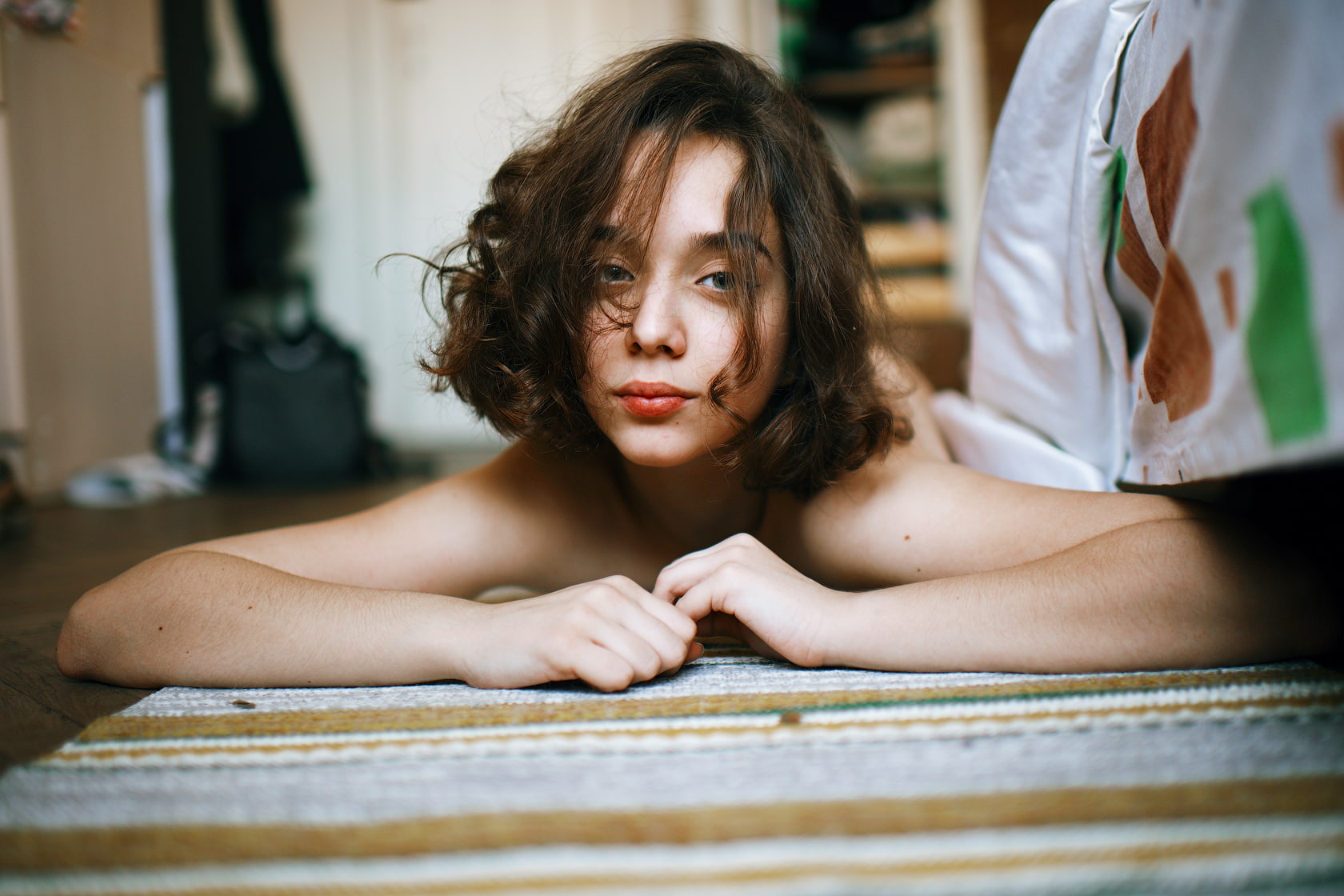 carpets, lying on front, Marat Safin, brunette, looking at viewer, depth of field, on the floor, women, 720P, women indoors, indoors, portrait, model, HD Wallpaper