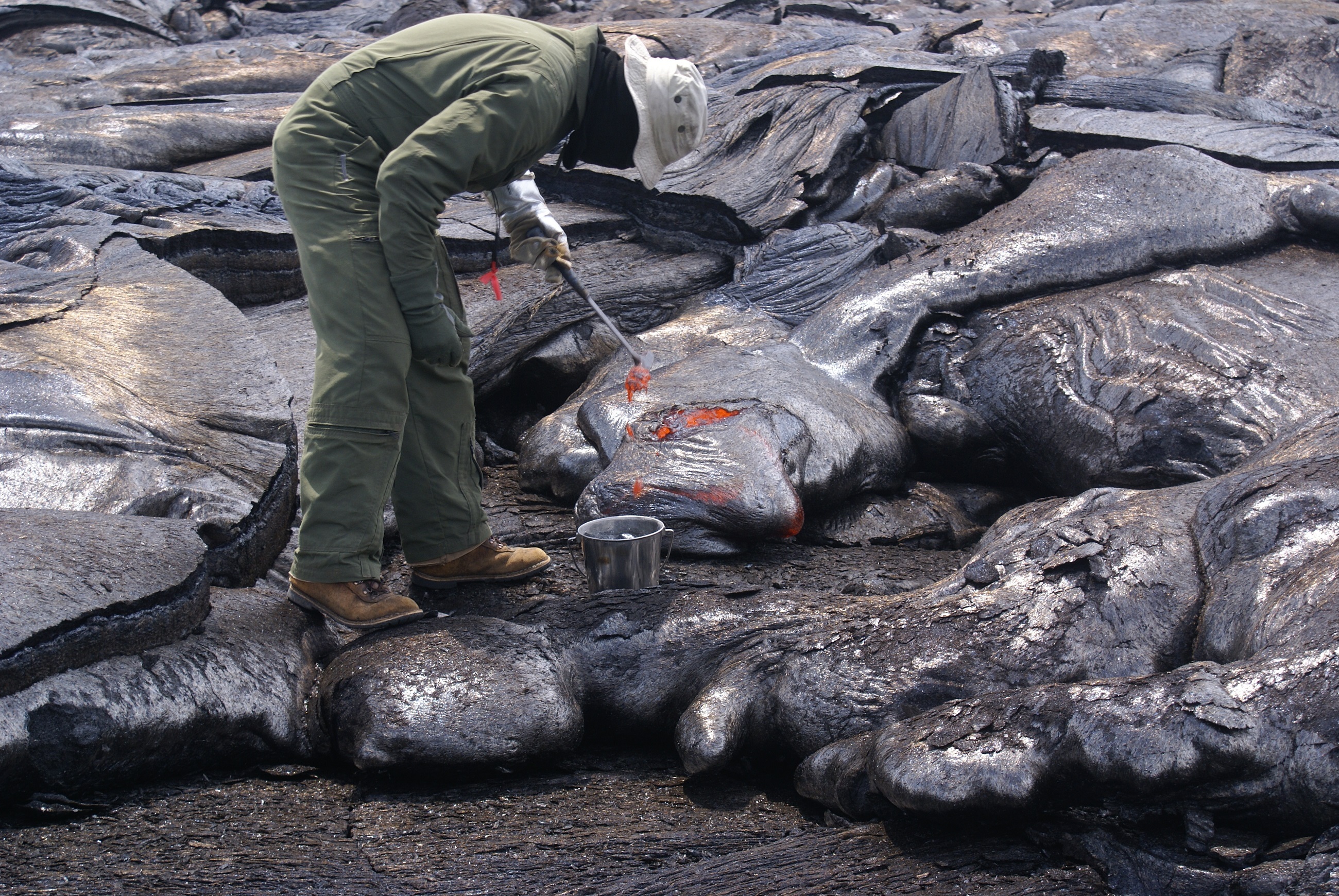 study, one person, occupation, working, flow, protective workwear, heat, sample, green, solid, bending, outdoors, full length, jumpsuit, lava, man, rock - object, HD Wallpaper