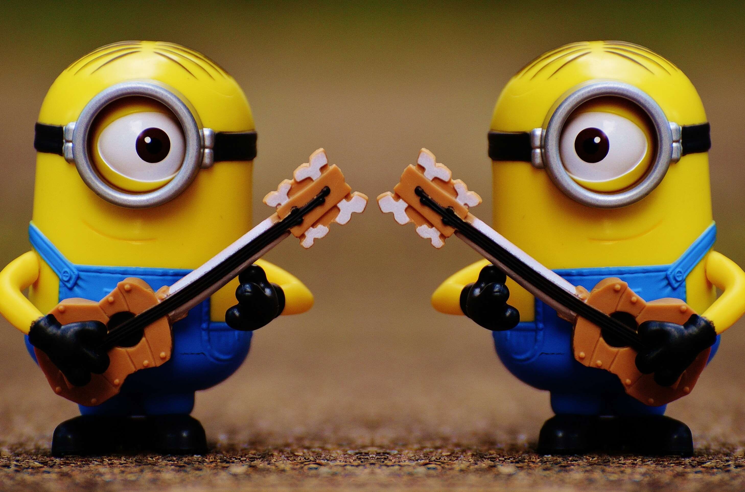 playing, yellow, human representation, macro, 2K, representation, wheel, sport, challenge, two objects, day, musical equipment, technology, miniature, HD Wallpaper