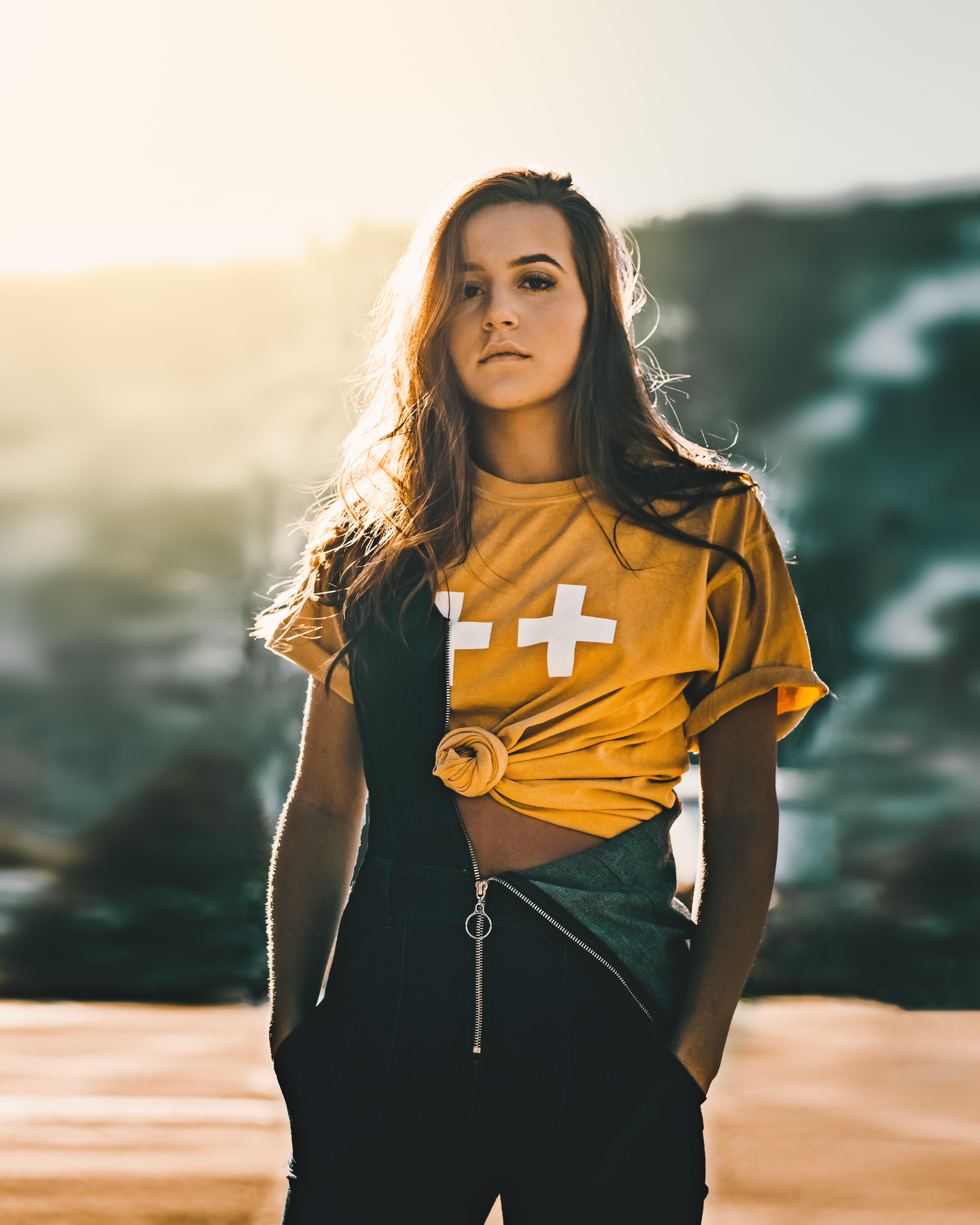 white, timberland, looking at camera, outdoors, nature, print, woman, waist up, young adult, shirt, mood, portrait, yellow, girl, 5K, beautiful woman, Phone HD Wallpaper
