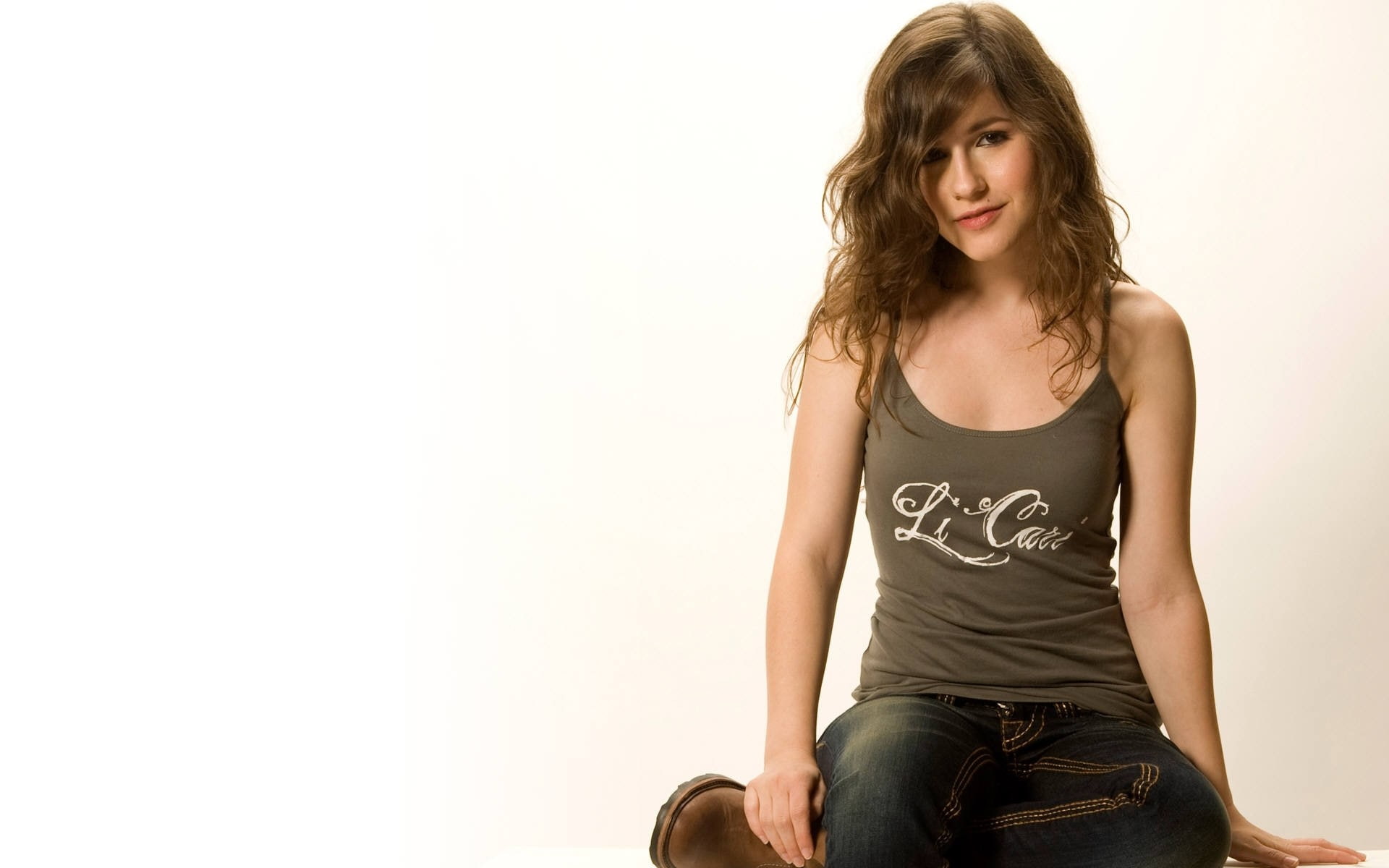 indoors, front view, 1080P, Erin sanders, one person, tank top, Shirt, Jeans, smiling, Brunette, Emotion, studio shot, portrait, confidence, hair, casual clothing, HD Wallpaper