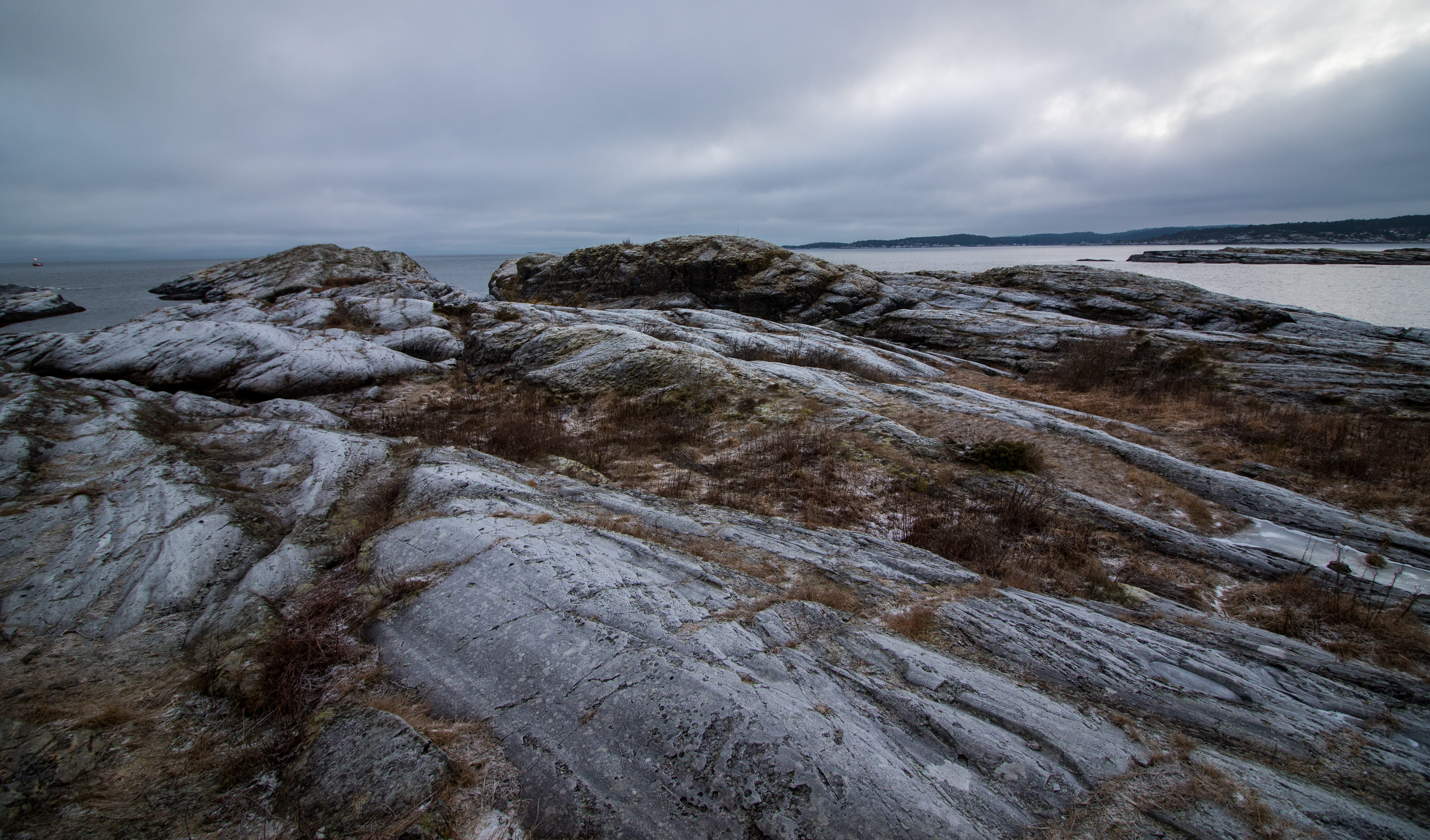 daylight, sea, 5K, grass, sky, eroded, rockyscape, horizon, tranquility, nature, day, rock, no people, ocean, gray, beach, outdoors, landscape, seascape, HD Wallpaper
