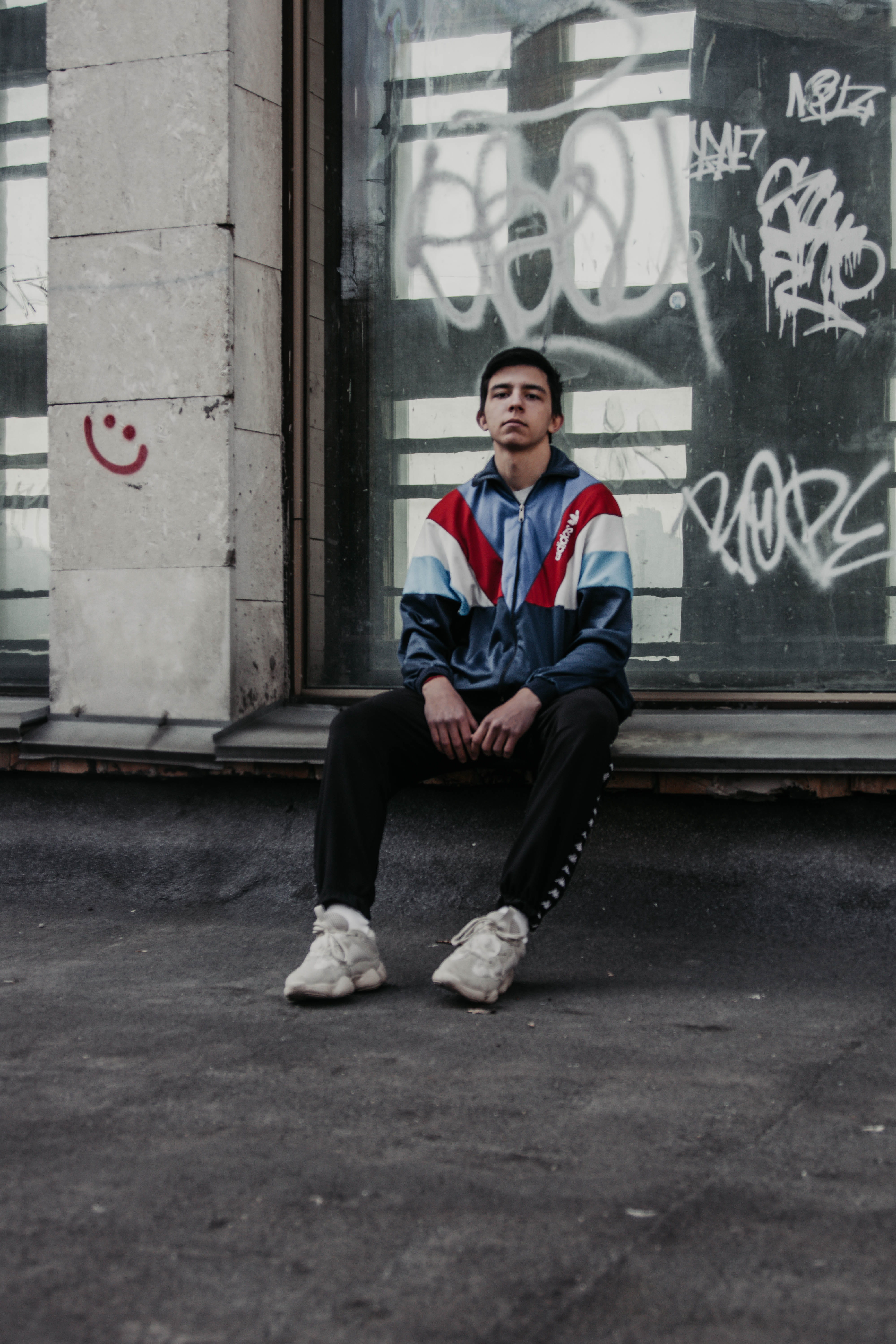 one person, shallow, graffiti, city, jacket, young adult, casual clothing, photo, young men, focus, 5K, man, emotion, full length, day, men, windbreaker, Phone HD Wallpaper