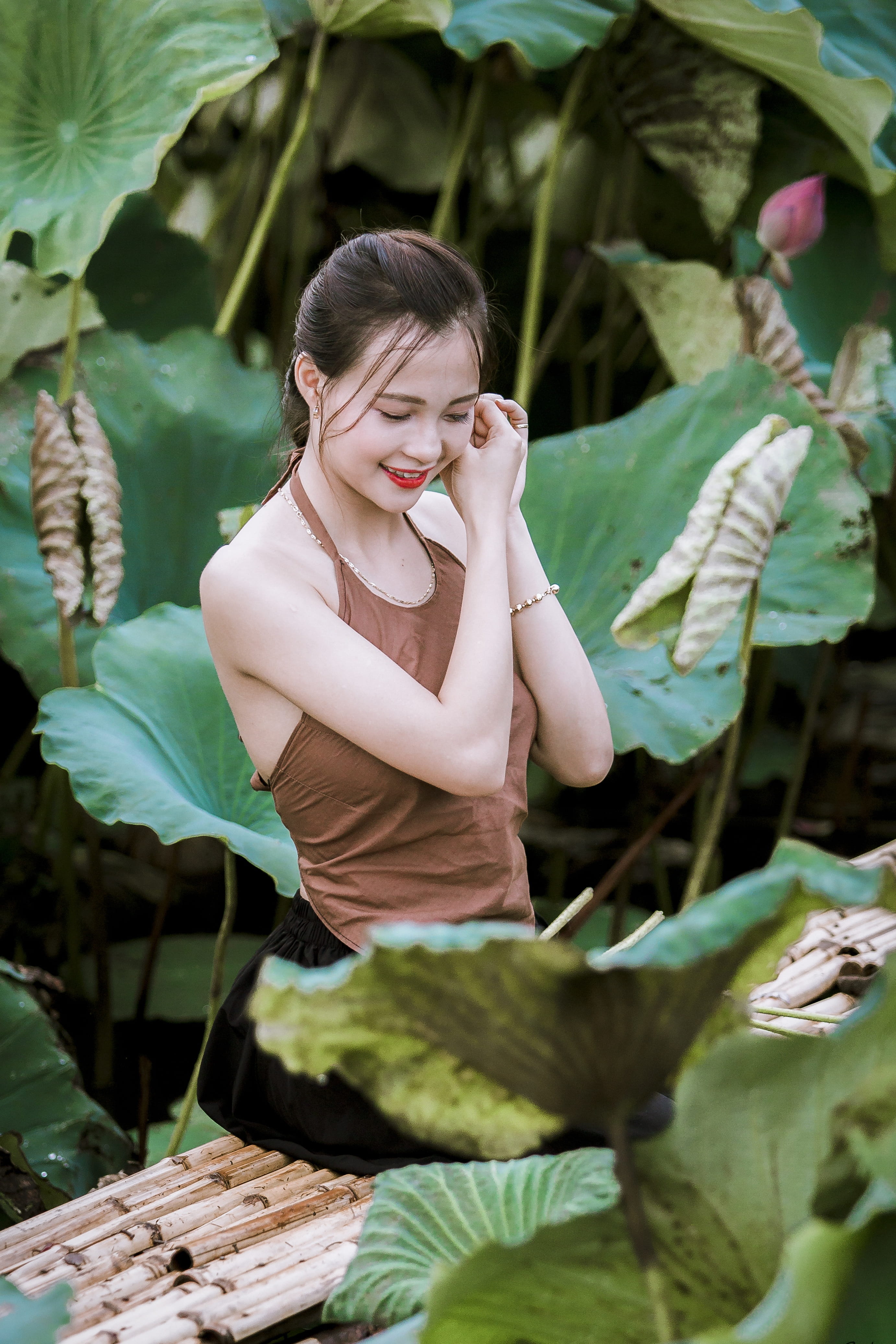 lotus, looking, lifestyles, teenager, one person, lotus flowers, leisure activity, casual clothing, plant part, portrait, young women, vietnam, smiling, Phone HD Wallpaper