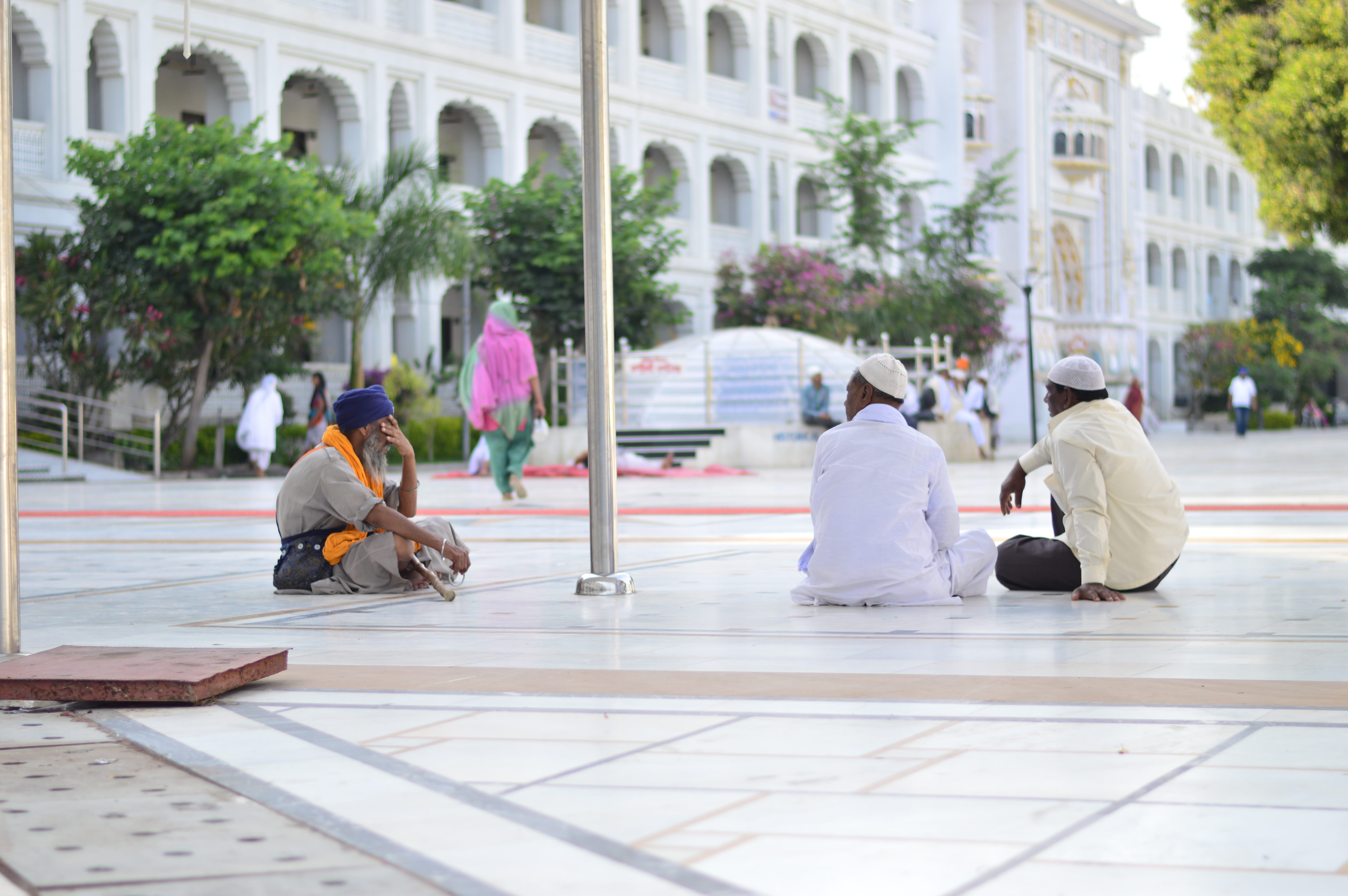 downtown, urban, nature, gurdwara, 5K, sitting, flooring, building, day, divide, city, group of people, people, adult, rear view, real people, built structure, HD Wallpaper