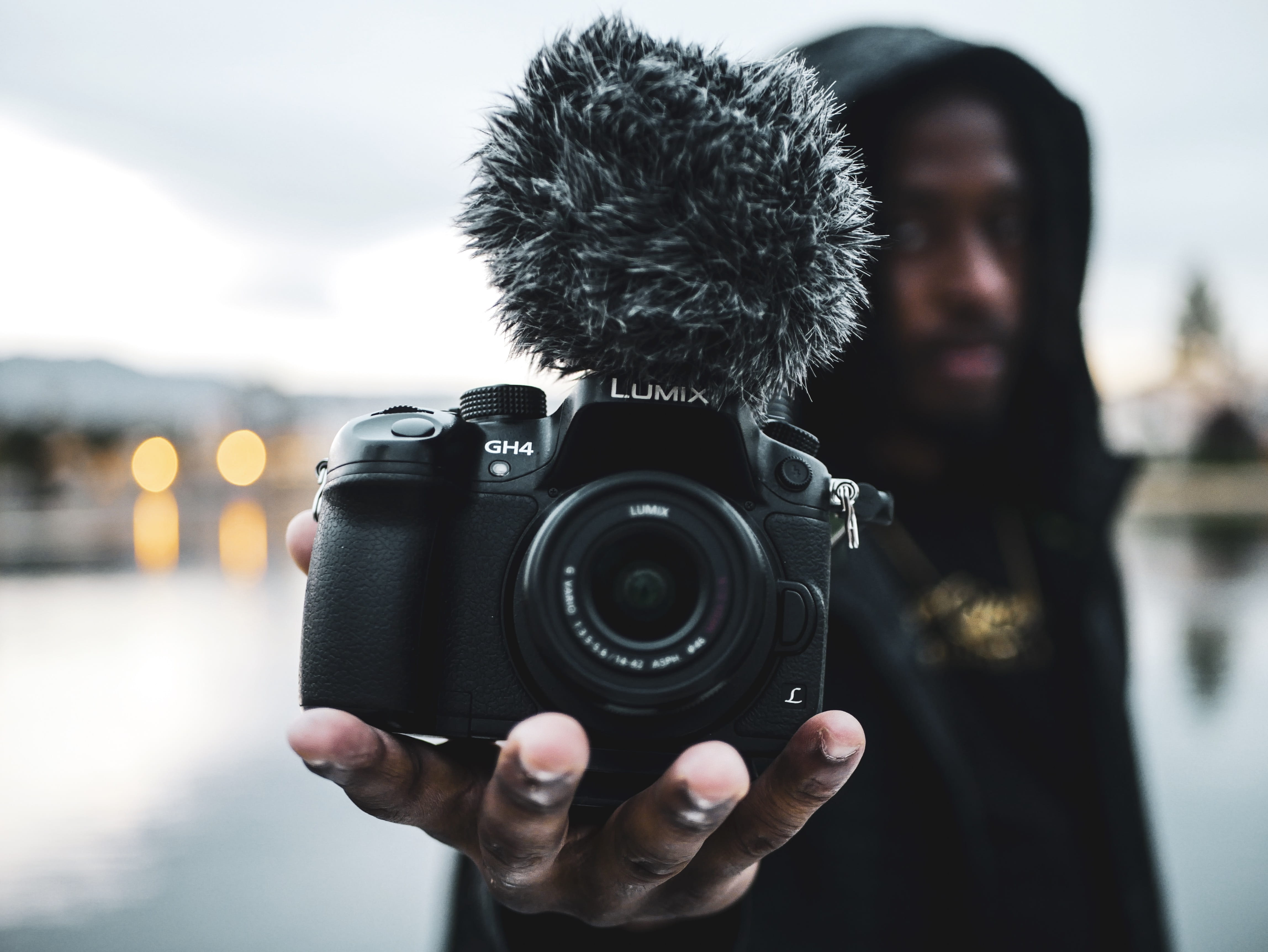 slr camera, warm clothing, zoom, finger, human hand, landscape, man, photographing, outdoors, photographer, camera, hand, lens, men, focus on foreground, HD Wallpaper