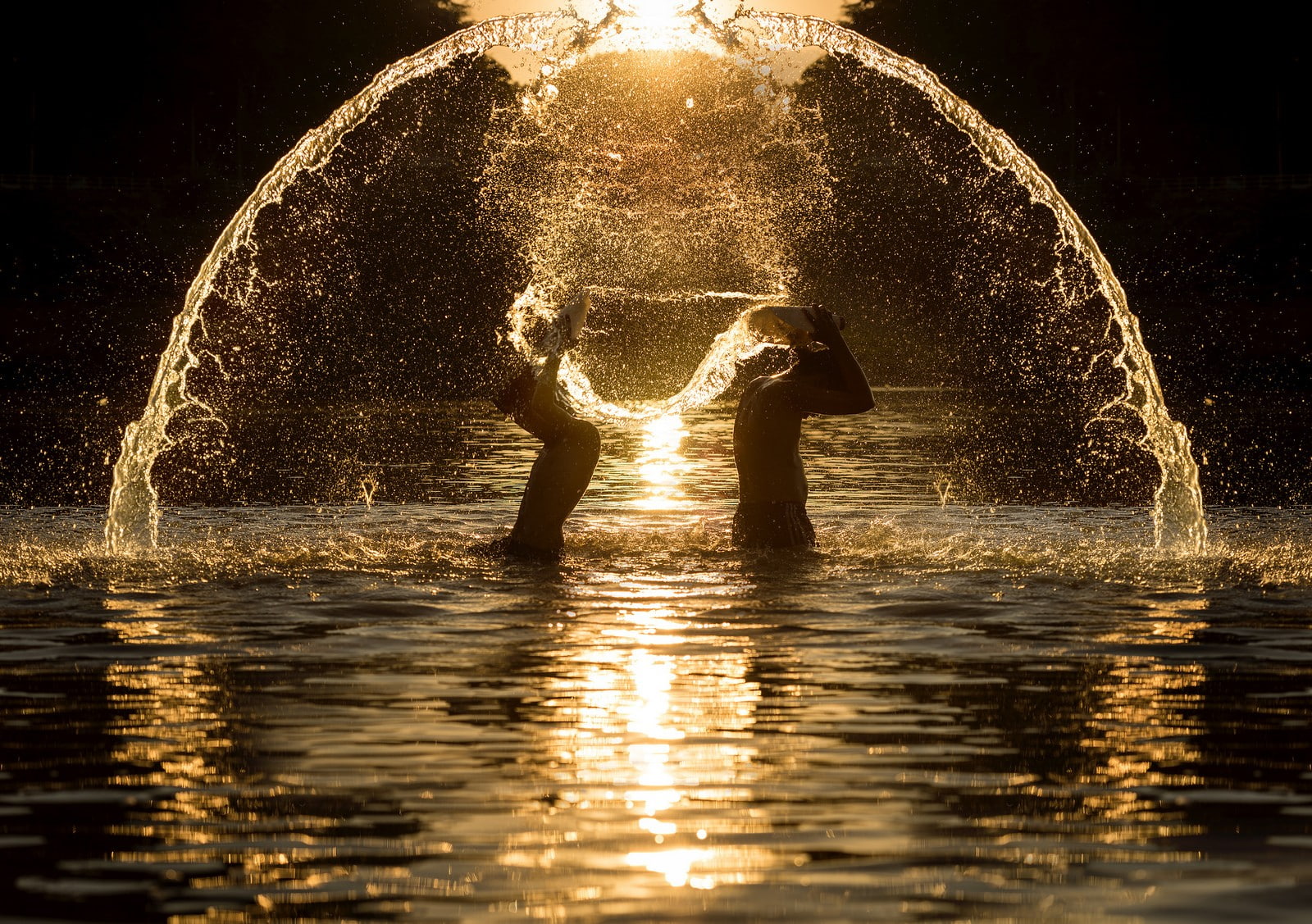 men, fun, emotion, waterfront, males, adult, water, silhouette, motion, positive emotion, reflection, splashing, sunlight, lifestyles, nature, boxing, 720P, HD Wallpaper
