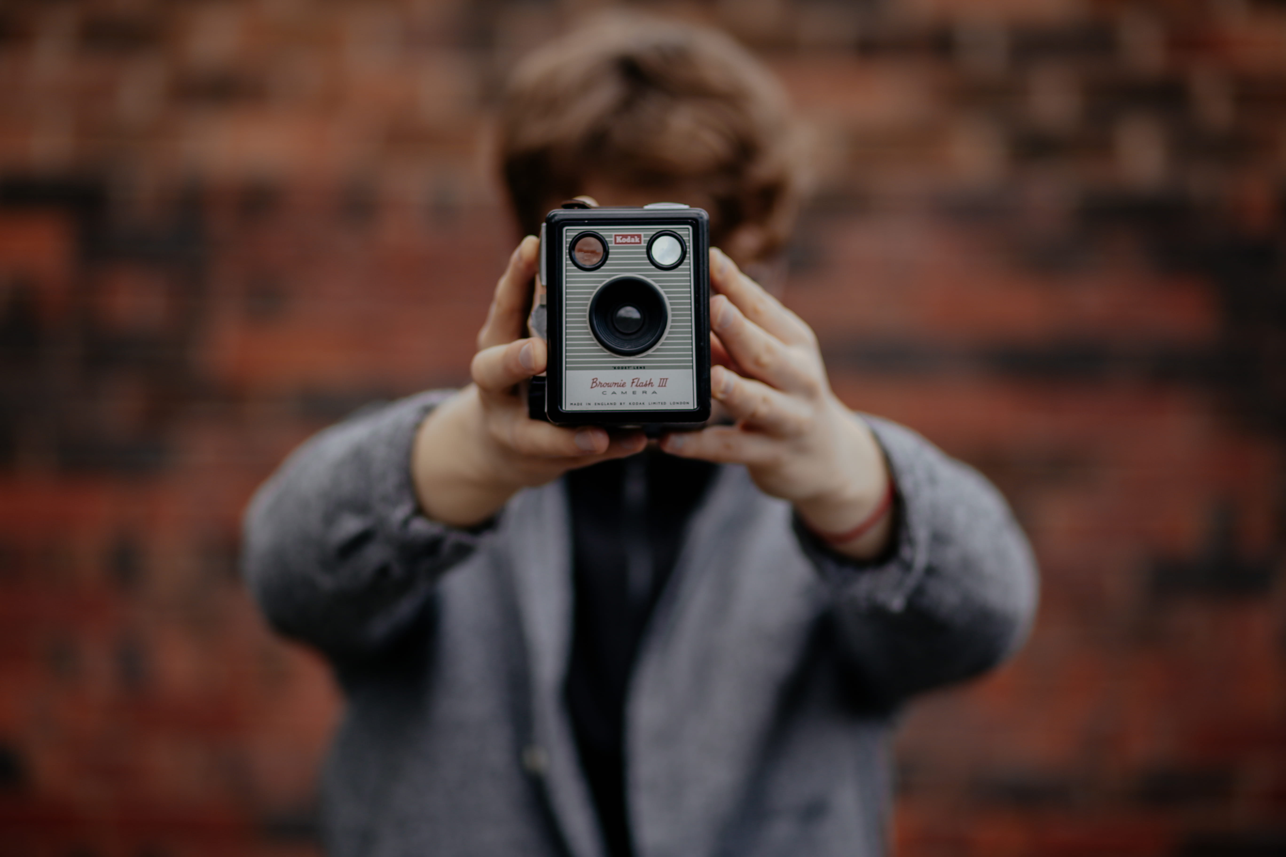 caucasian Ethnicity, men, males, holding, camera - Photographic Equipment, photography Themes, technology, photography, photographer, brick, person, equipment, HD Wallpaper