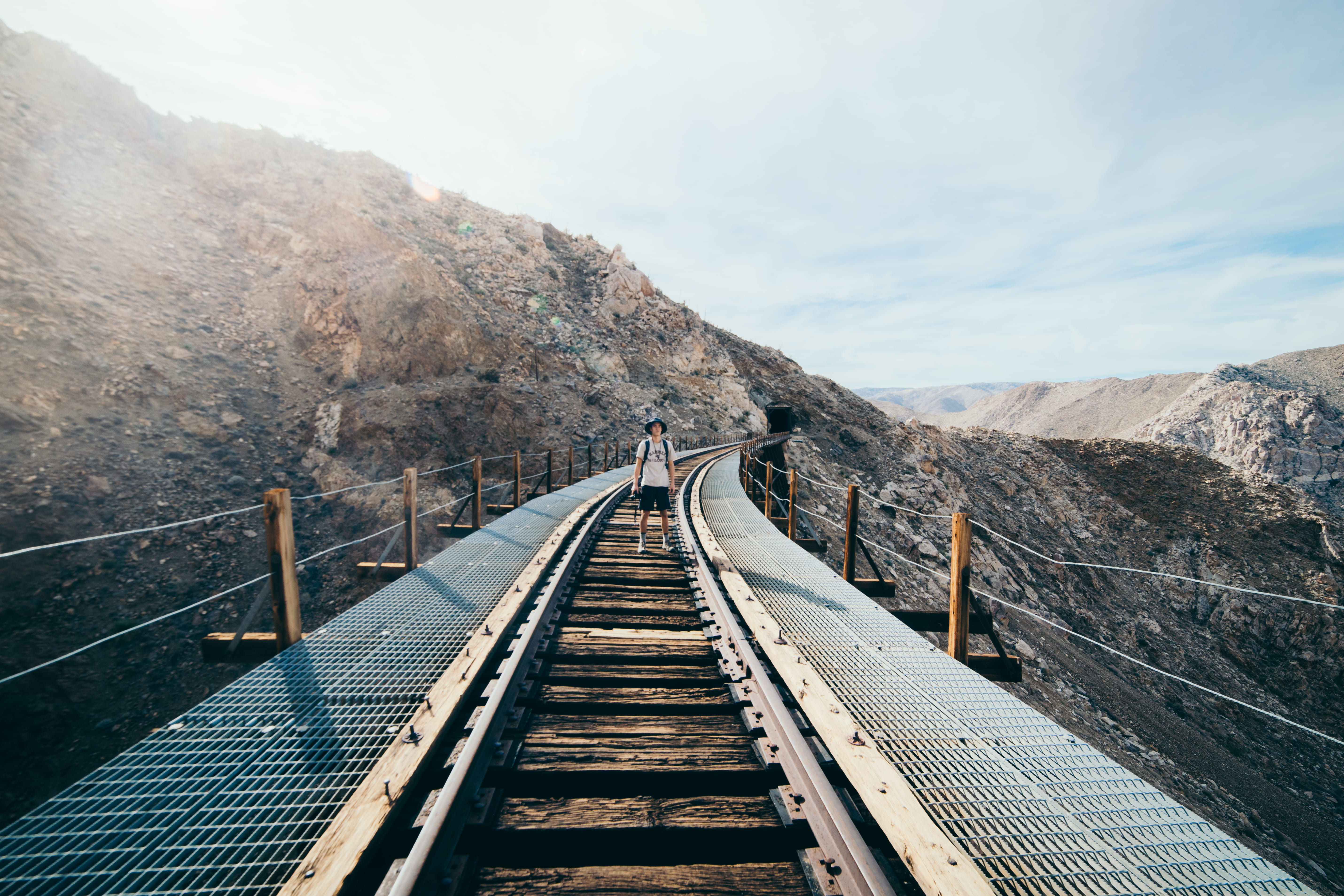 hot, rock, standing, sun, light, wire, rock - Object, scenics, no People, hike, travel, 5K, person, road, railroad, rail, mountain, fence, perspective, HD Wallpaper
