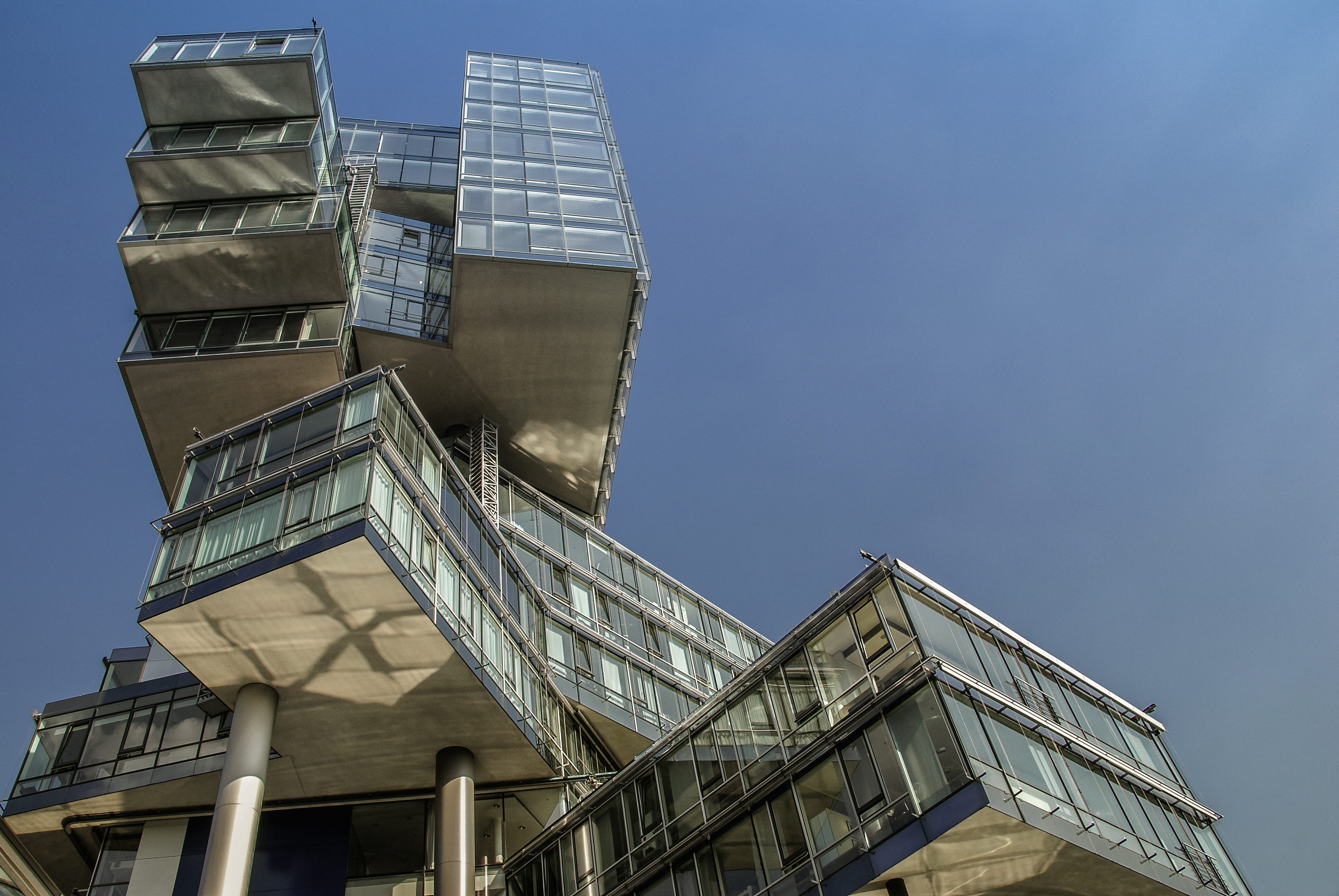 building, company, management, tower, nord lb, hanover, glass, travel destinations, outdoors, clear sky, 4K, nature, skyscraper, low angle view, tall - high, HD Wallpaper