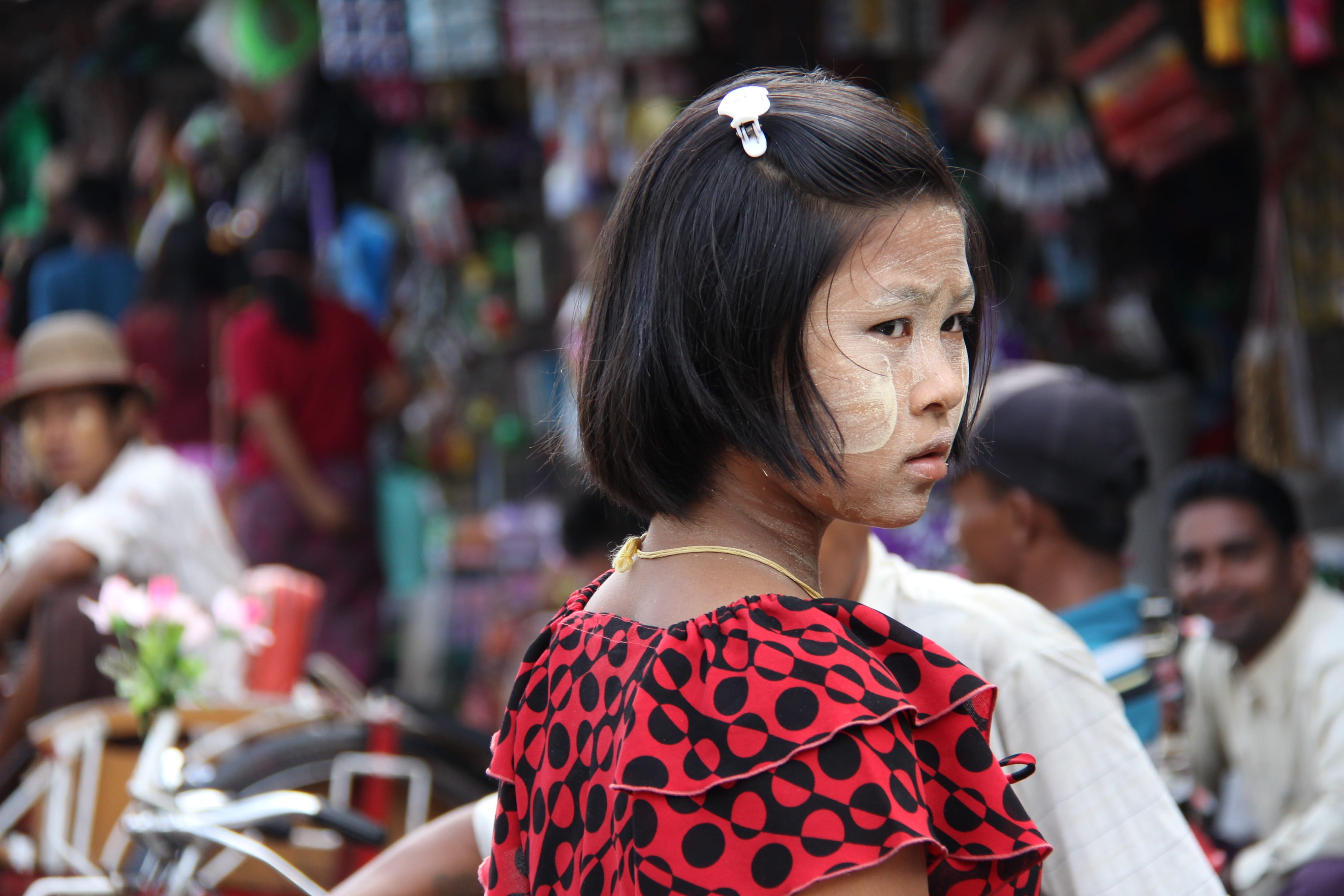 incidental people, market, young, girl, hairstyle, adult, headshot, contemplation, 2K, young adult, watching, burmese, travel, bangs, real people, lifestyles, HD Wallpaper