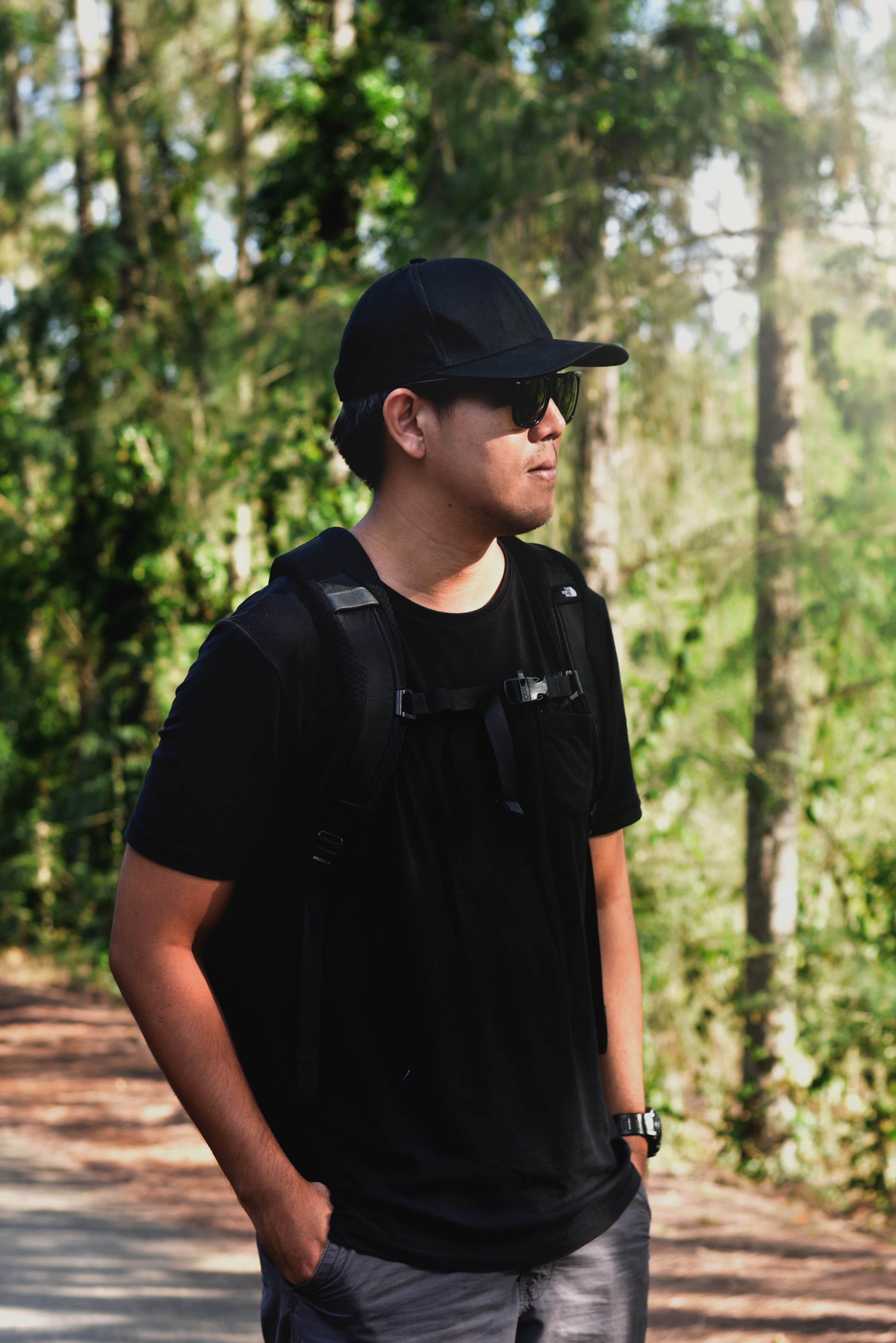 clothing, casual clothing, traveler, looking, morning, leisure activity, man, one person, young men, cap, plant, lifestyles, fashion, black color, front view, Phone HD Wallpaper