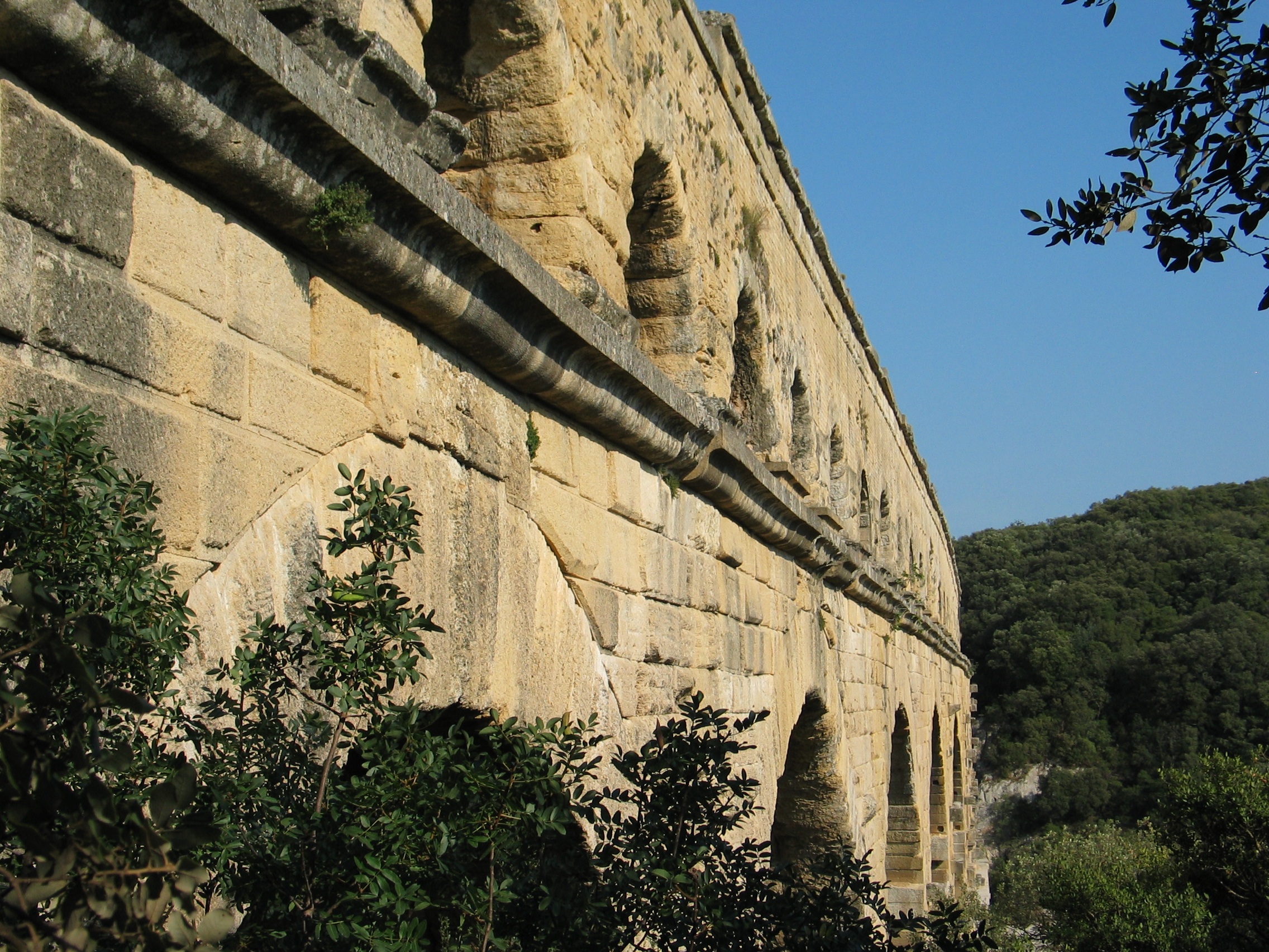 sky, outdoors, low angle view, architectural column, no people, travel destinations, pont du gard, building exterior, france, old, tree, nature, archaeology, HD Wallpaper