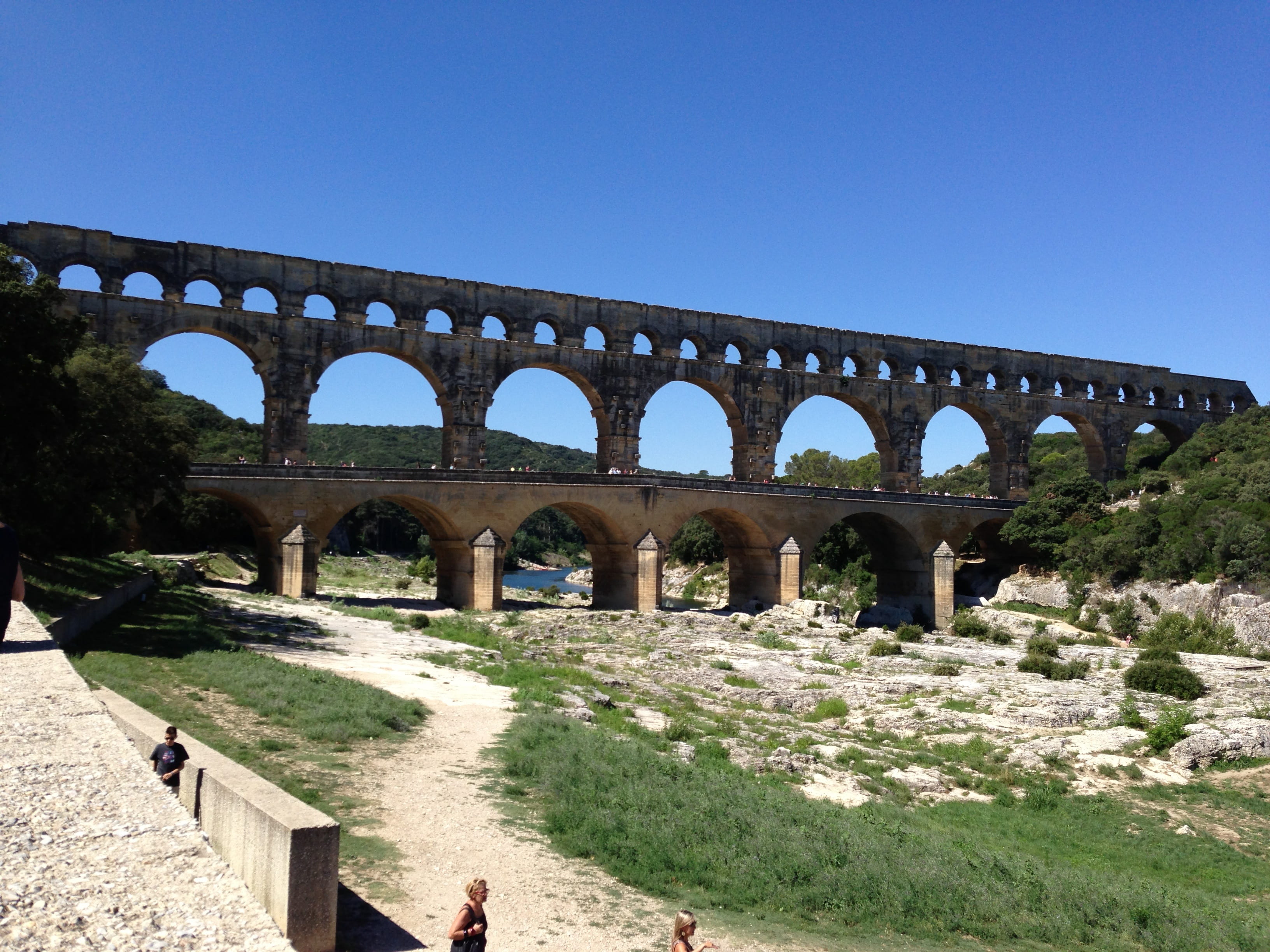 sky, France, nature, travel, clear sky, blue, Pont Du Gard, arch bridge, day, travel destinations, ancient civilization, ancient, arched, built structure, HD Wallpaper