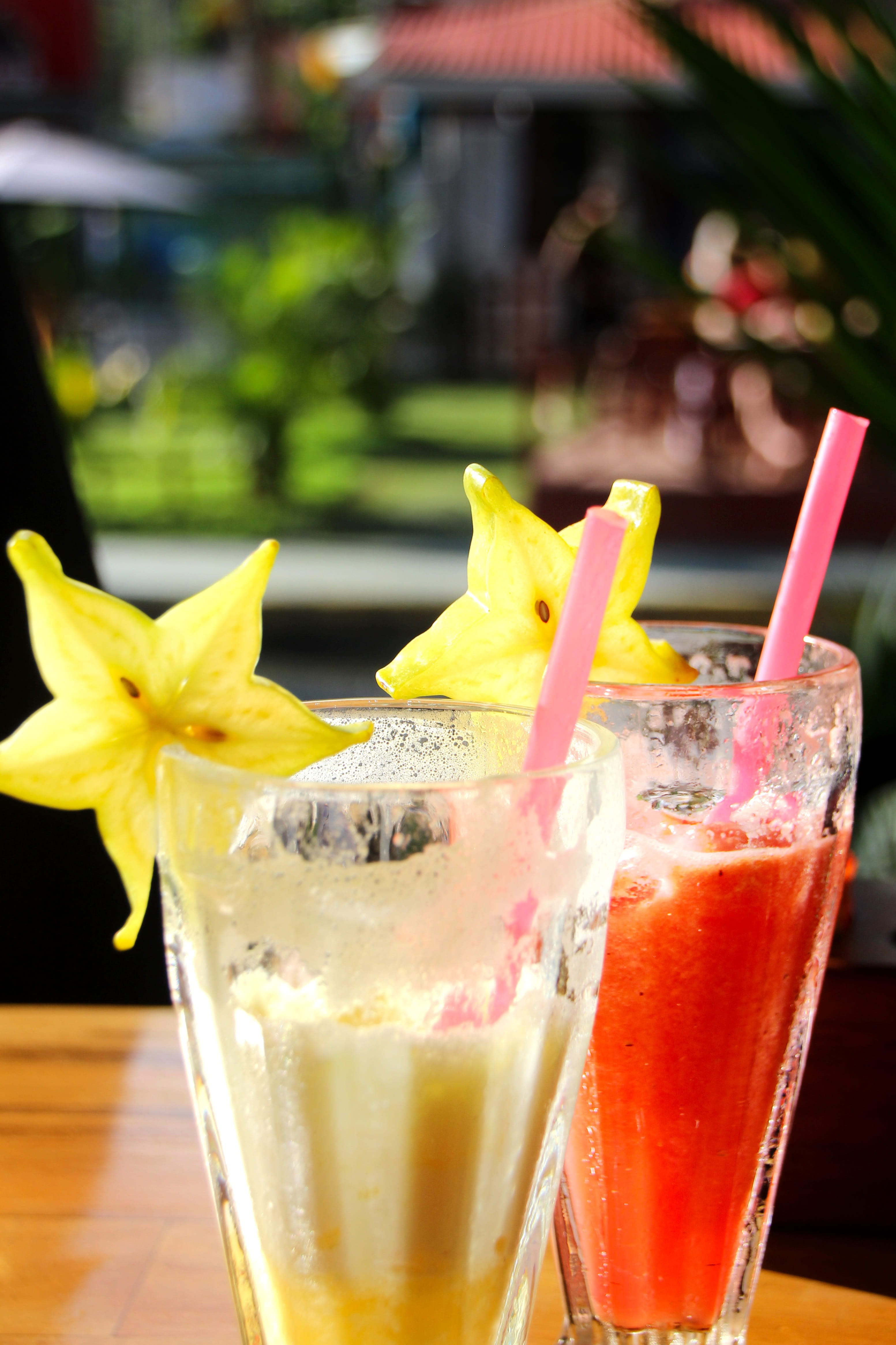 drink, juice, drinking glass, tropical drink, food, bar, focus on foreground, yellow, thirst, outdoors, glass, beverages, healthy eating, vacations, household equipment, Phone HD Wallpaper