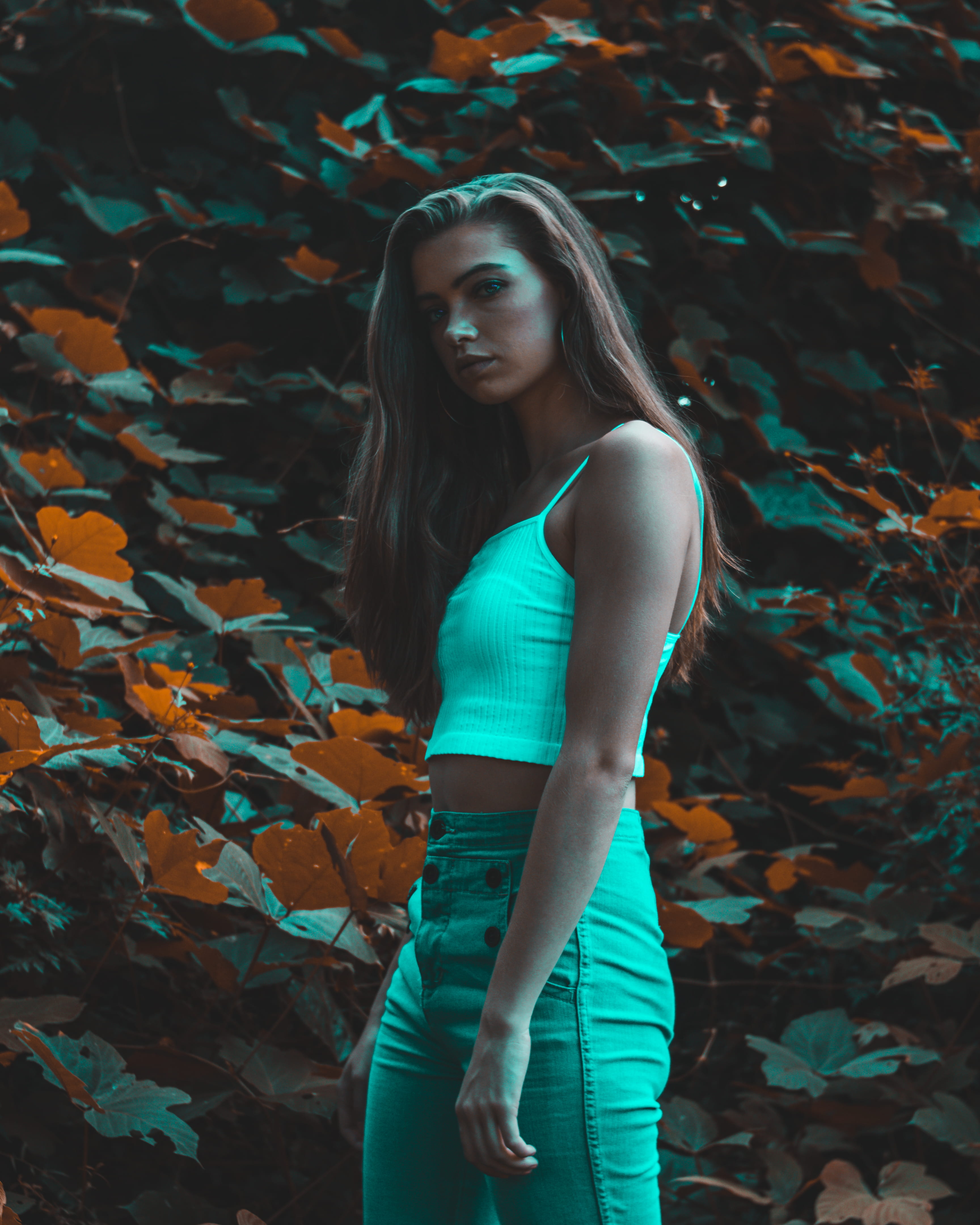 4K, portrait, land, leaf, teenager, casual clothing, real people, trees, one person, young adult, standing, beautiful woman, outdoors, ivy, looking at camera, Phone HD Wallpaper