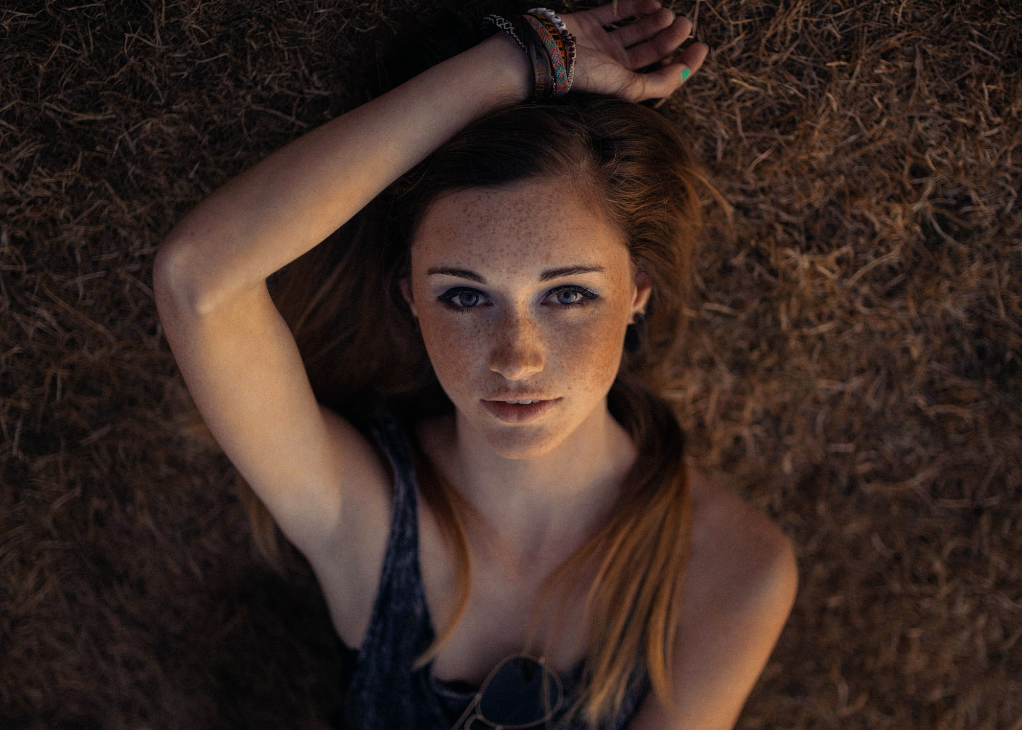 redhead, women, freckles, long hair, top view, looking at viewer, blue eyes, face, 1080P, model, lying down, portrait, HD Wallpaper