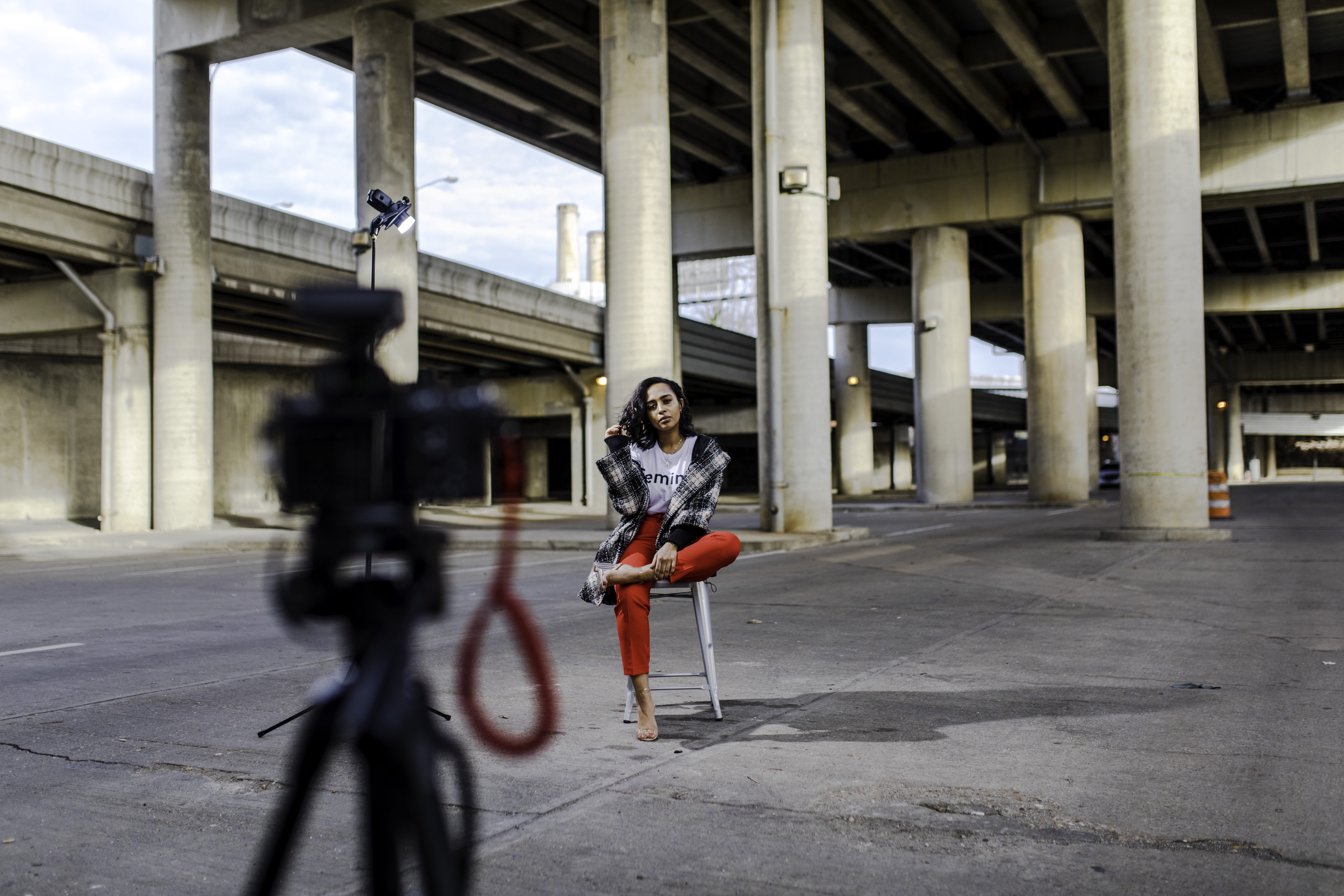 riding, jacket, pavement, adult, concrete structure, architectural column, wearing, mode of transportation, photoshoot, architecture, plaid, city, outdoors, HD Wallpaper