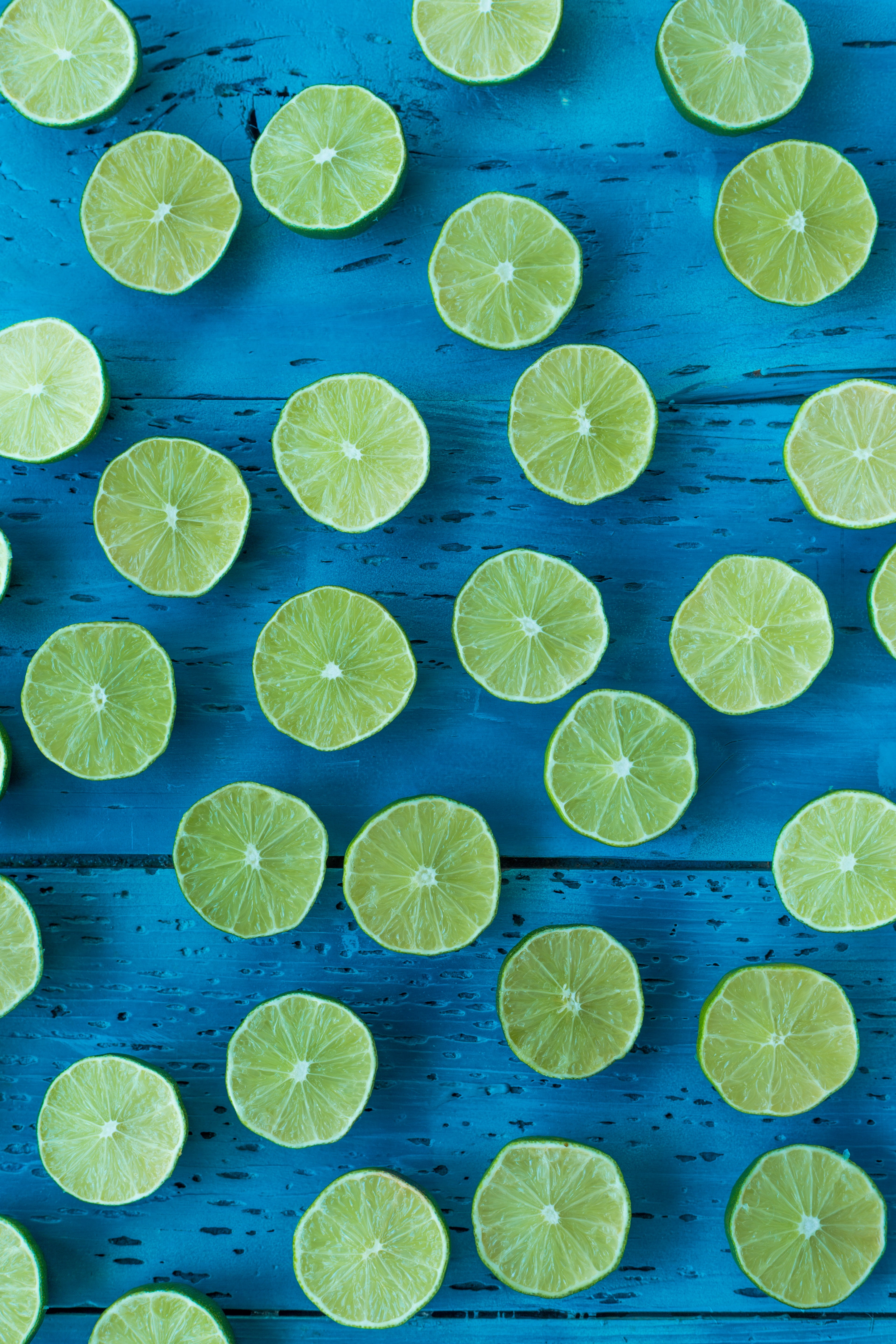 citrus Fruit, lime, fruit, food, organic, food and drink, slice, flowers, indoors, vitamin, no People, ripe, close-up, wellbeing, multi Colored, backgrounds, Phone HD Wallpaper