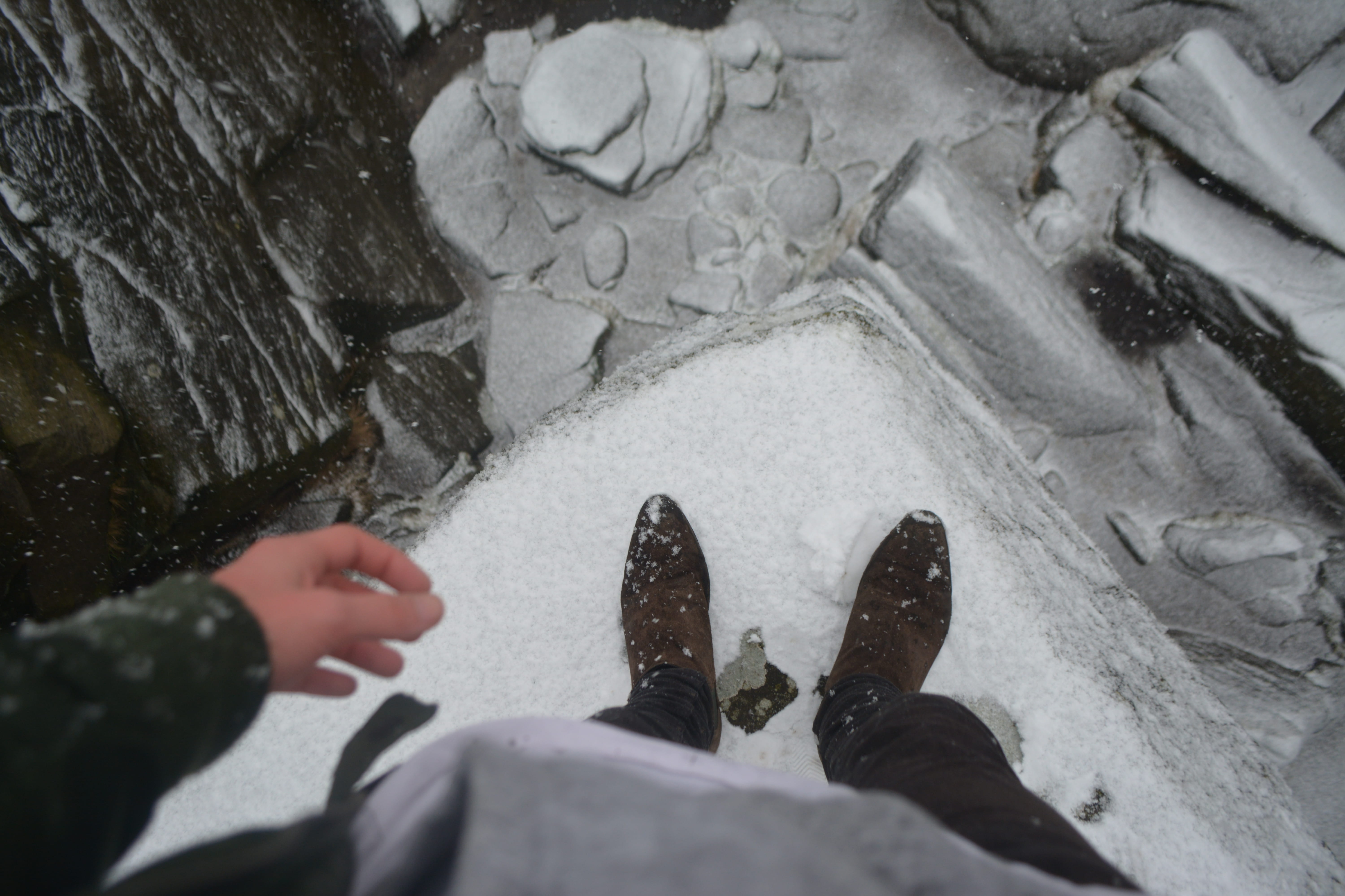 lifestyles, cold, day, one person, cold temperature, shoes, winter, personal perspective, hight, rocks, leisure activity, standing, snow, 5K, warm clothing, HD Wallpaper