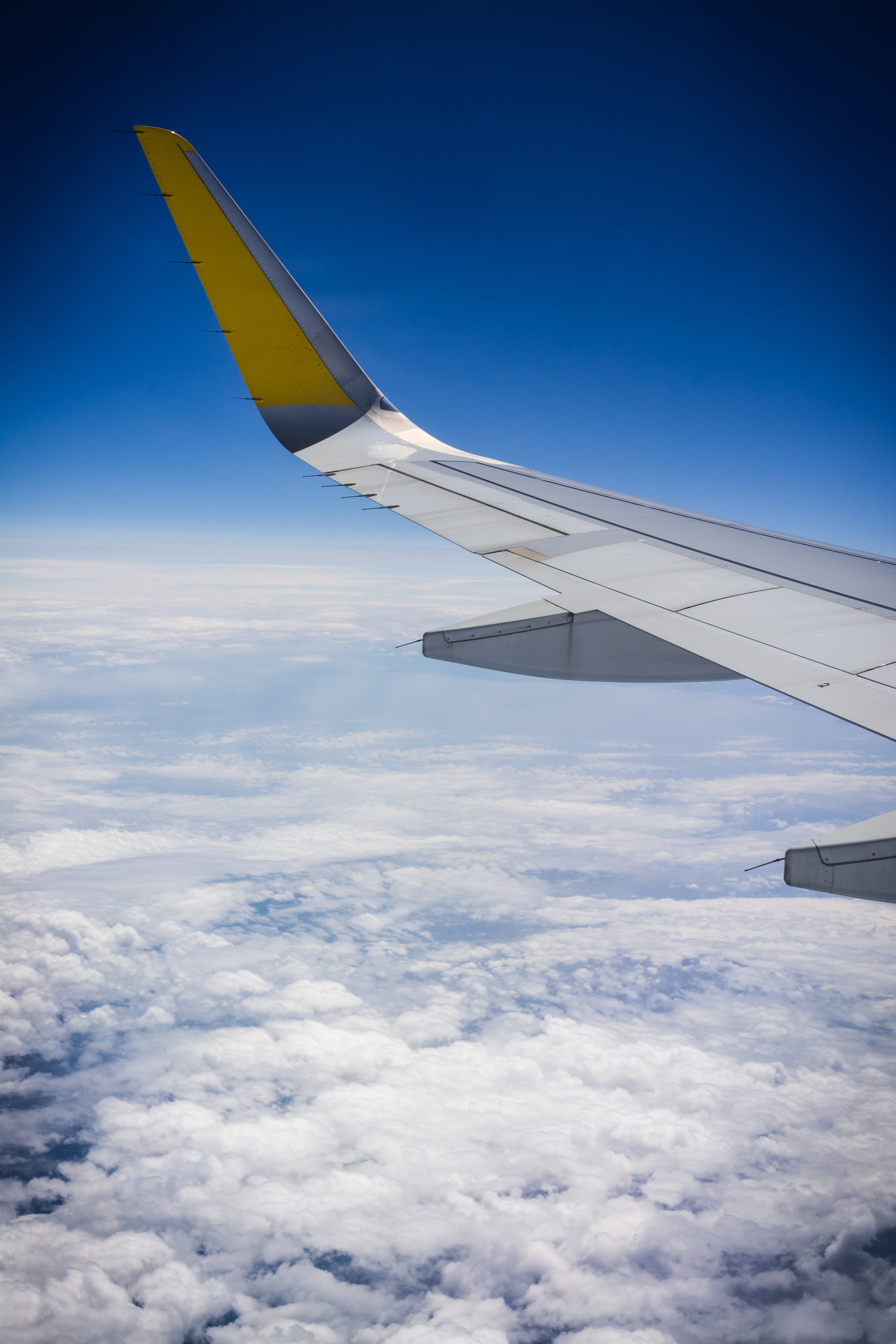 clouds, plane, beauty in nature, cloud - sky, above, transportation, cloudscape, airport, voyage, motion, blue, vacation, flying, scene, mode of transportation, Phone HD Wallpaper