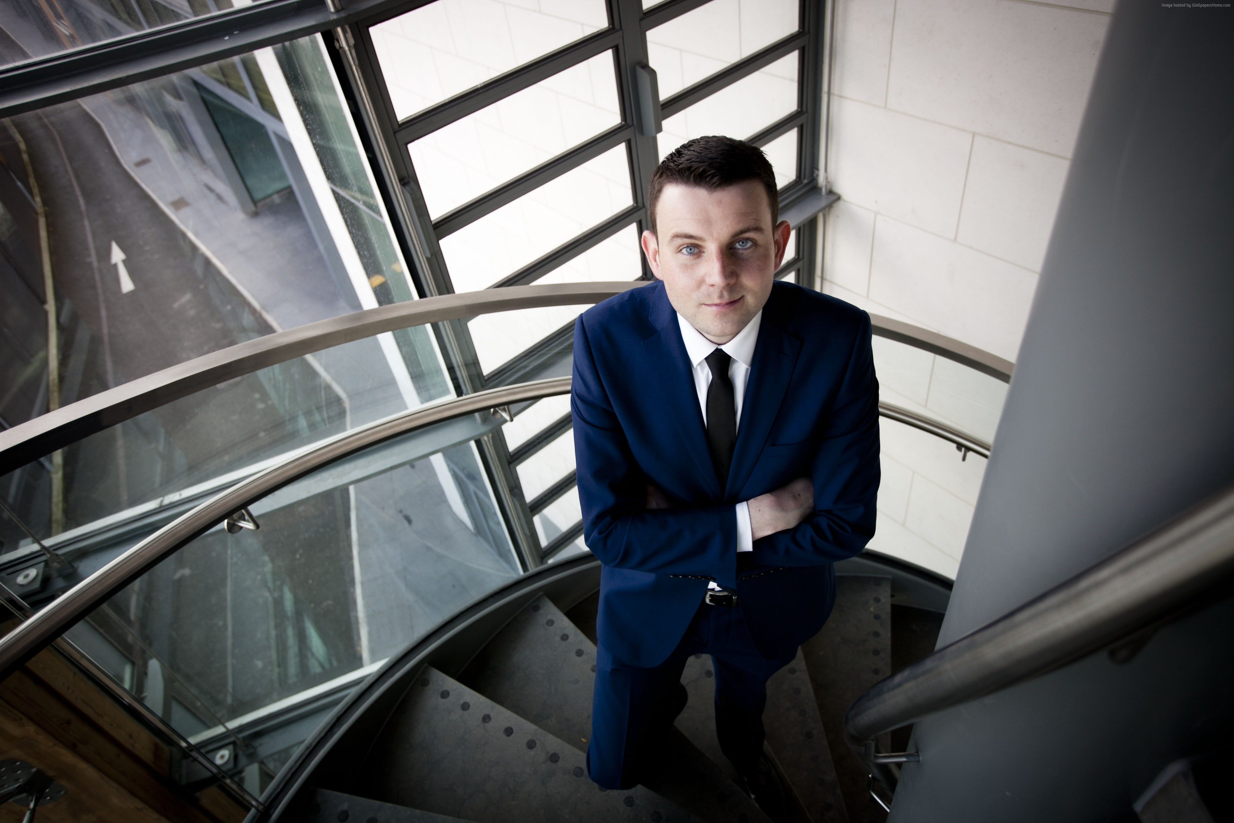 TV personality, Chris Donoghue, well-dressed, contemplation, looking at camera, men, indoors, architecture, 4K, staircase, railing, steps and staircases, HD Wallpaper
