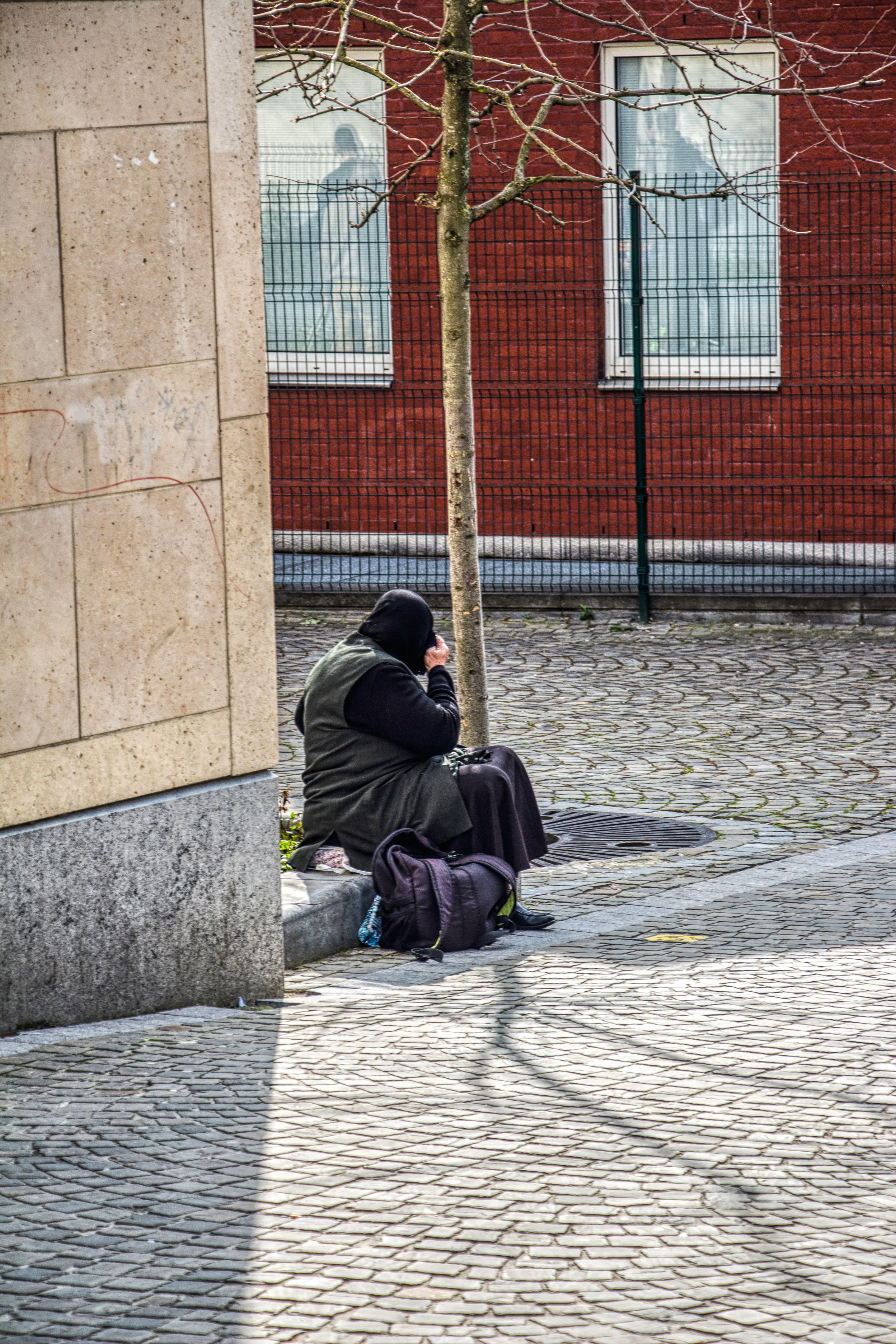 footpath, pavement, overcoat, musical instrument, pedestrian, building exterior, clothing, casual clothing, day, side view, walkway, one person, social issues, Phone HD Wallpaper