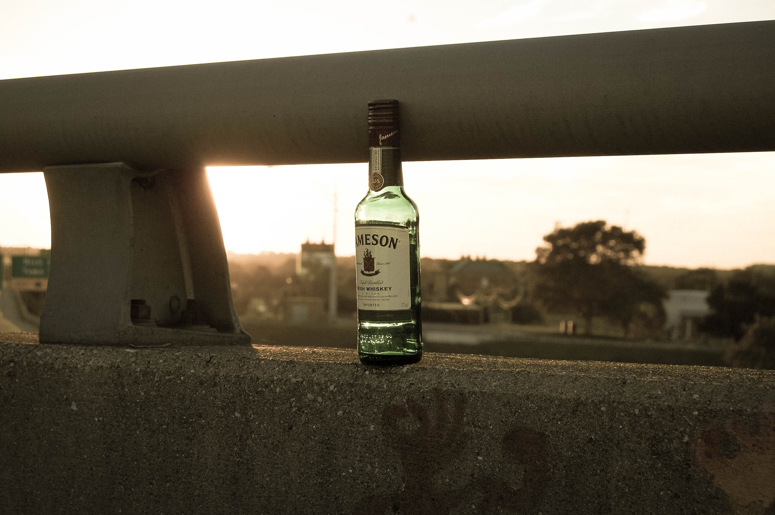 sign, bottle, day, outdoors, whiskey, built structure, outside, 2K, trees, outdoor, communication, city, road, columbus, western script, architecture, HD Wallpaper