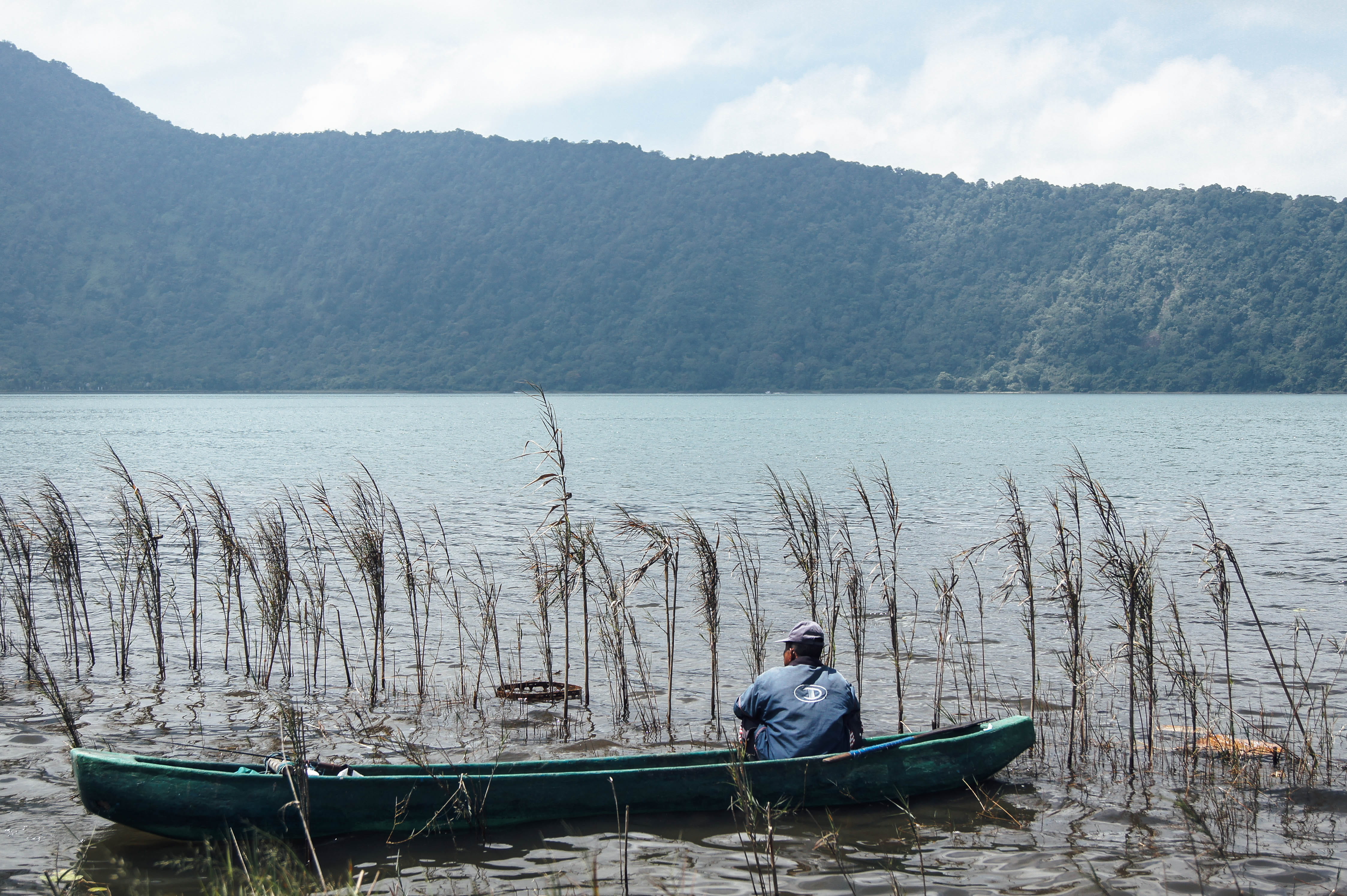 water, non-urban scene, rowboat, scenics - nature, bedugul, sitting, denpasar timur, transportation, casual clothing, reed, lake beratan temple tour, mountain, HD Wallpaper
