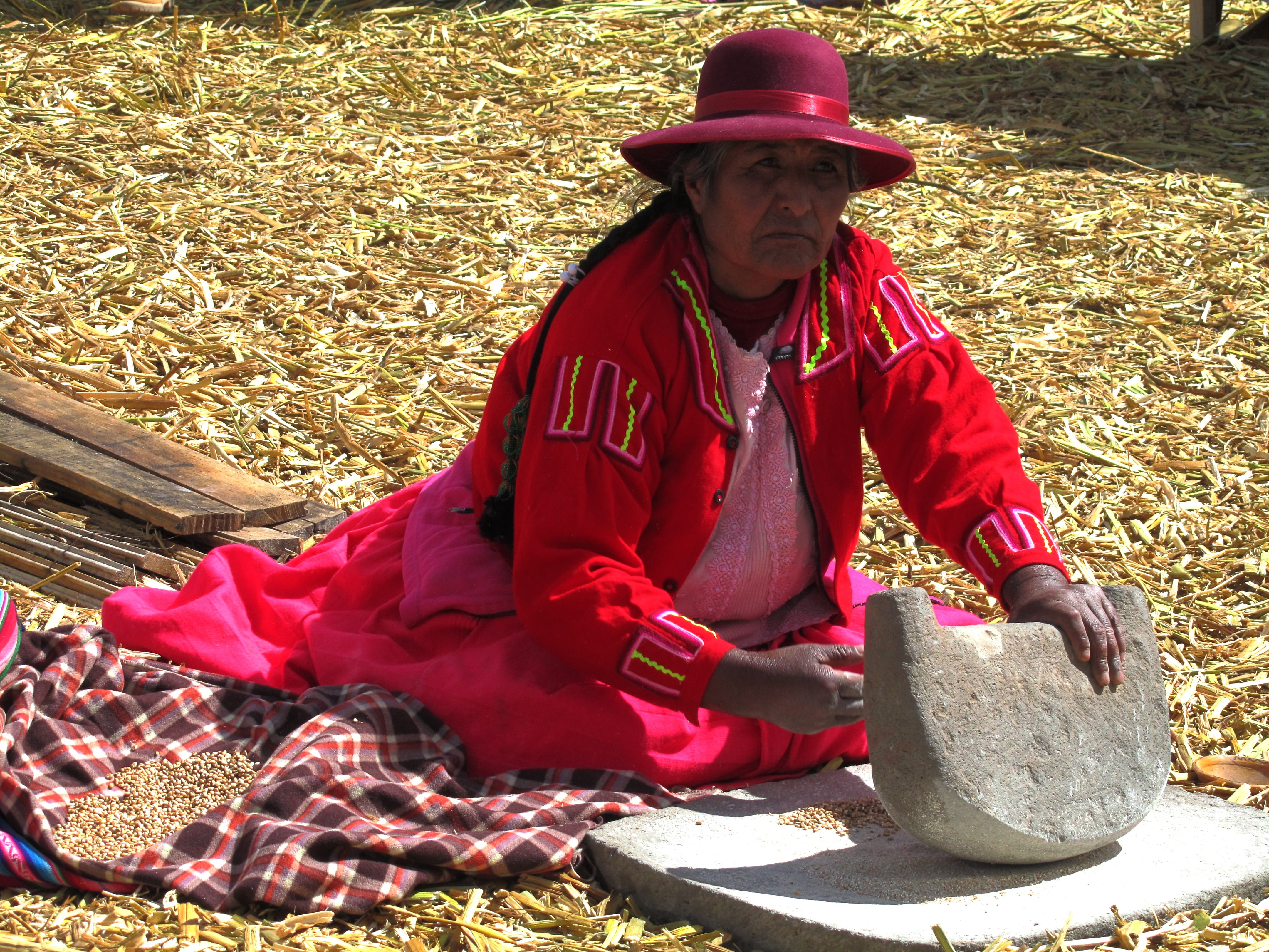 adult, outdoors, uros, grind, occupation, titicaca, tradition, 4K, casual clothing, full length, front view, nature, sunlight, holding, mature adult, peru, HD Wallpaper