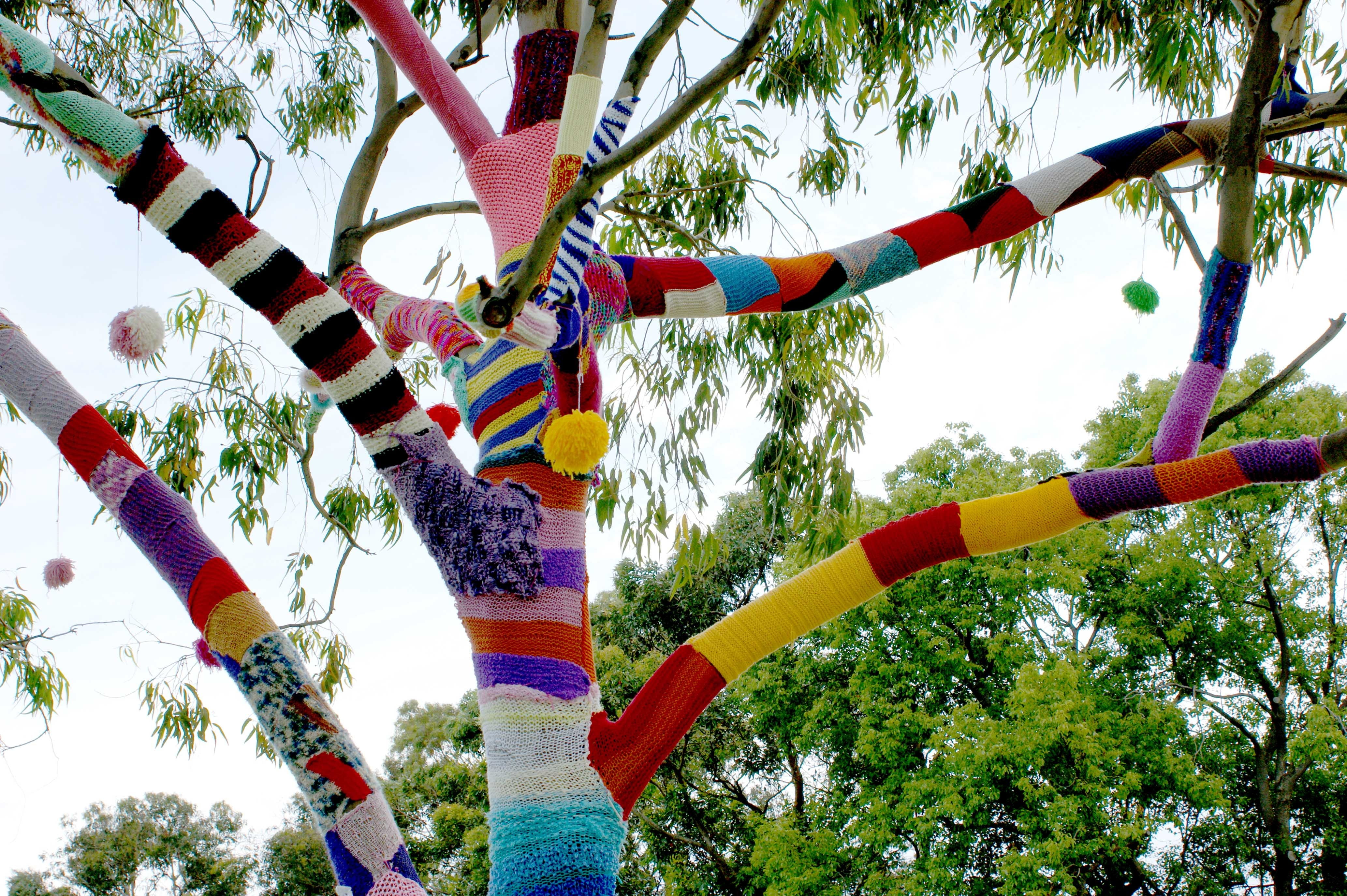 art and craft, hand-knitting, growth, guerrilla, day, hand, hanging, daytime, green, plant, tree, celebration, yarn bomb, low angle view, yarn, yarn bombing, HD Wallpaper