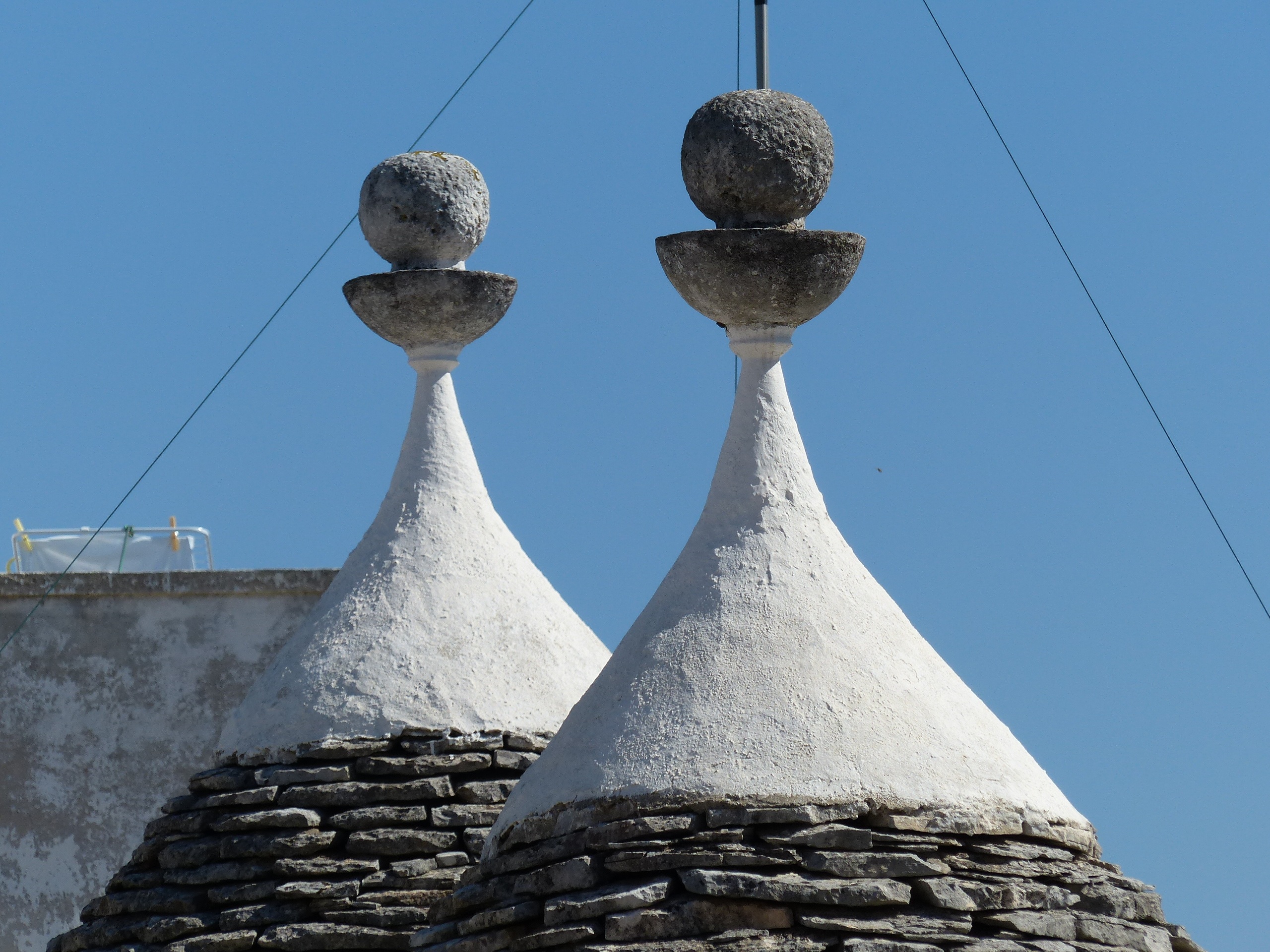 rotunda, outdoors, cable, built structure, building exterior, day, stone material, white color, clear sky, architecture, blue, old, sky, puglia, alberobello, HD Wallpaper