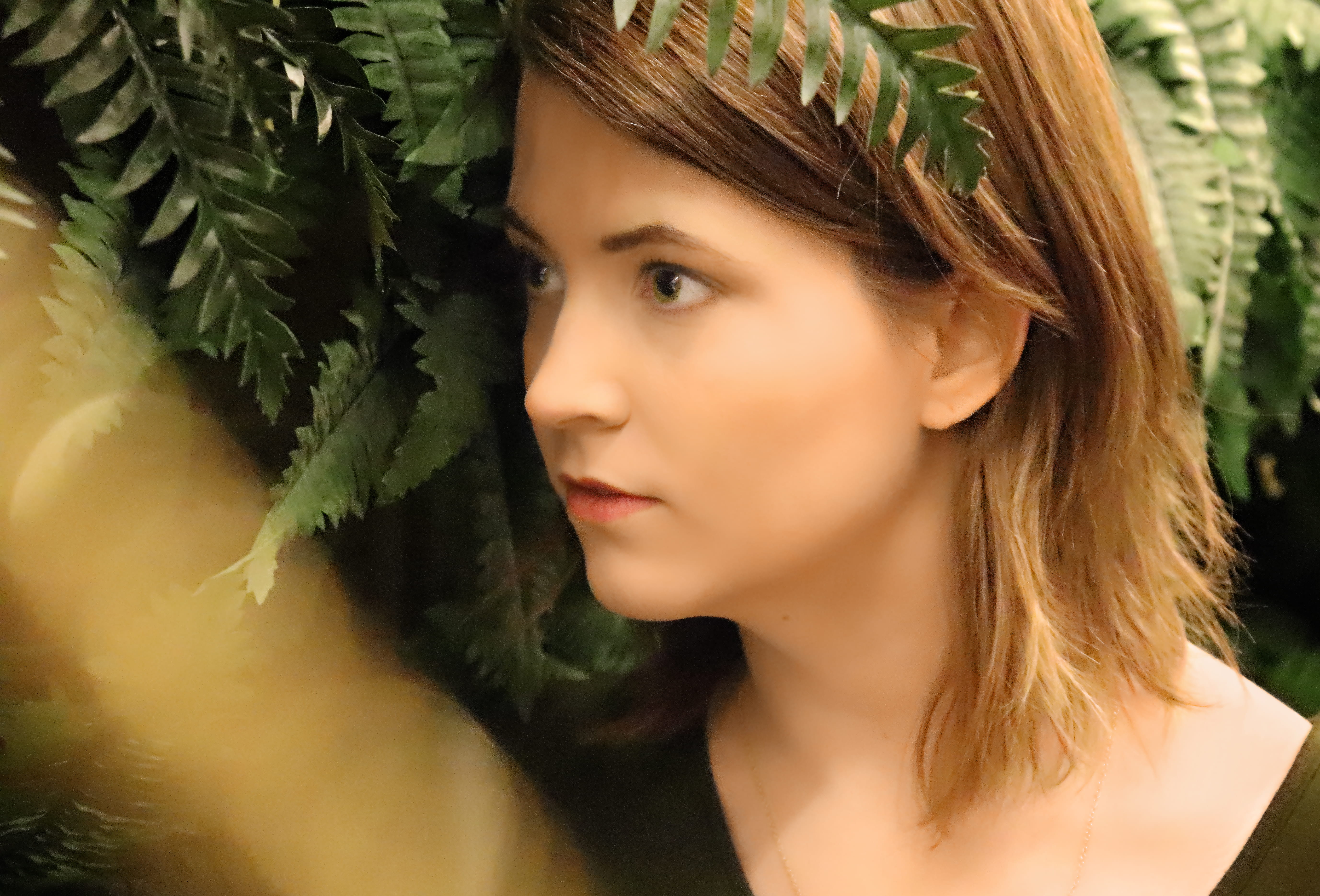 contemplation, outdoors, young adult, brunette, leaf, greenery, hairstyle, look left, young women, looking, eyes look left, adult, dream, plant, beautiful woman, HD Wallpaper