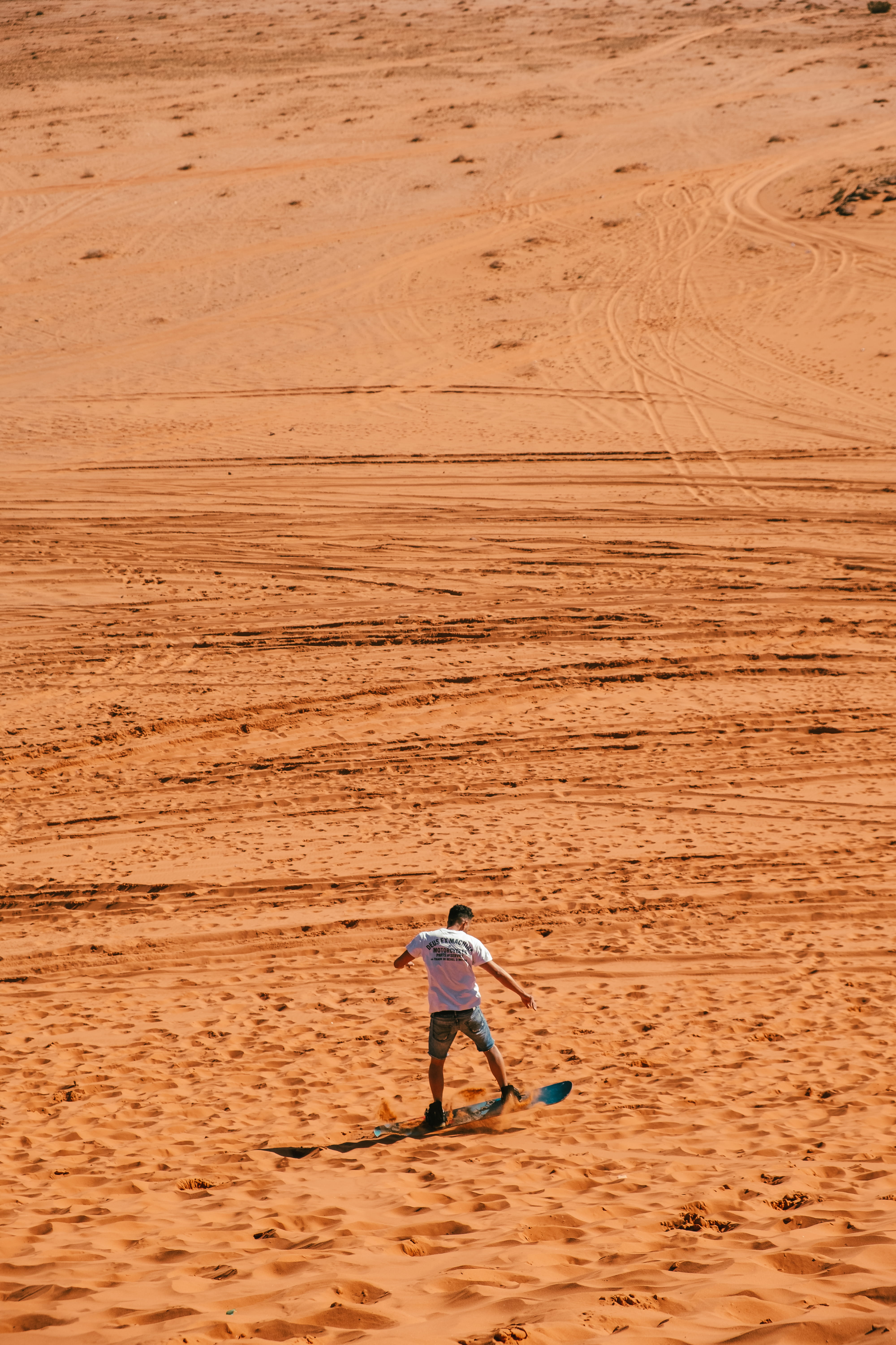 snowboard, casual clothing, sand, clothing, scenics - nature, real people, desert, jordan, one person, soil, arid climate, lifestyles, orange, person, red sand, Phone HD Wallpaper