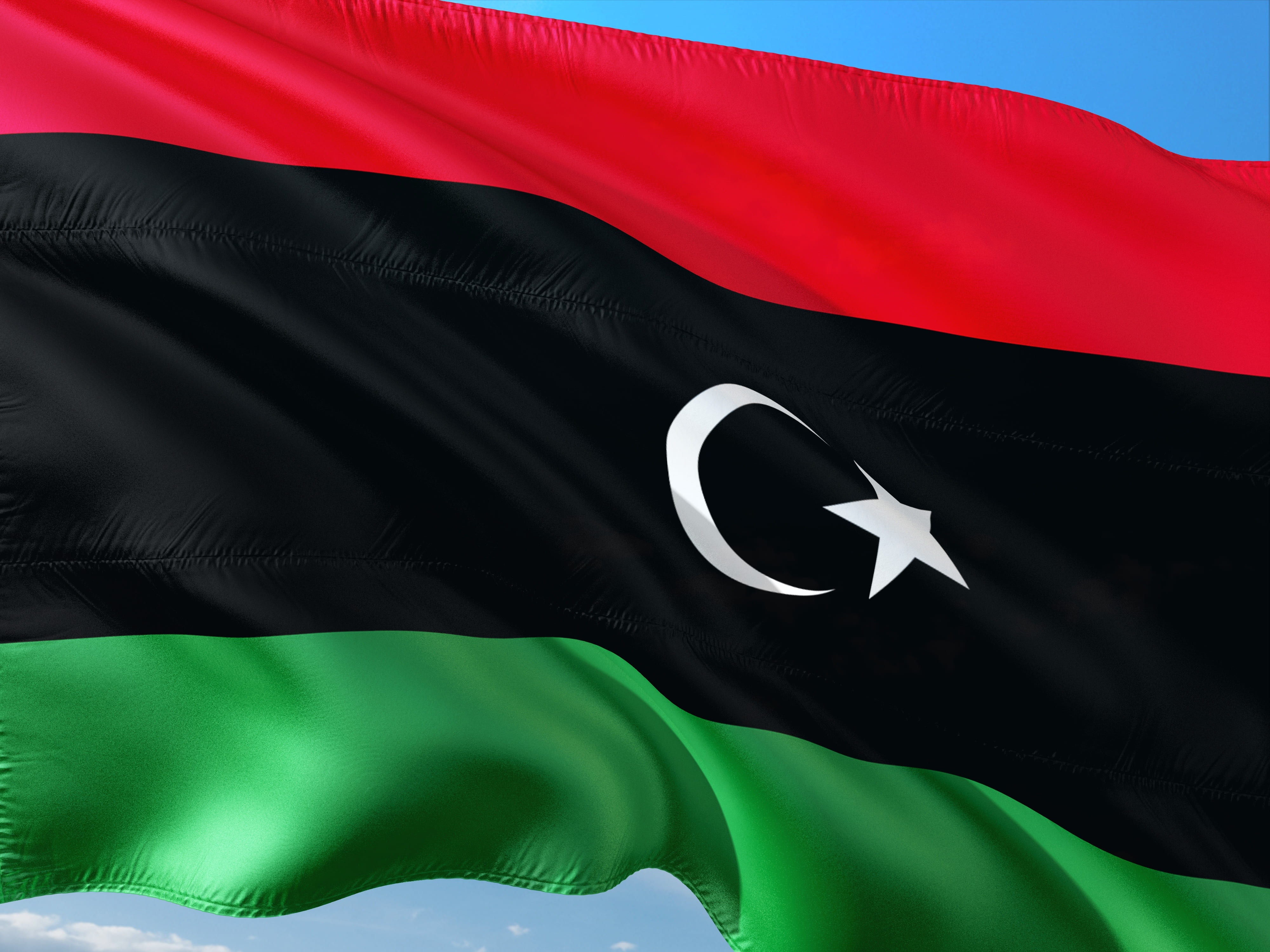 textile, backgrounds, international, flag, red, libya, symbol, human limb, people, shape, human body part, 4K, lybia, hat, patriotism, body part, clothing, HD Wallpaper