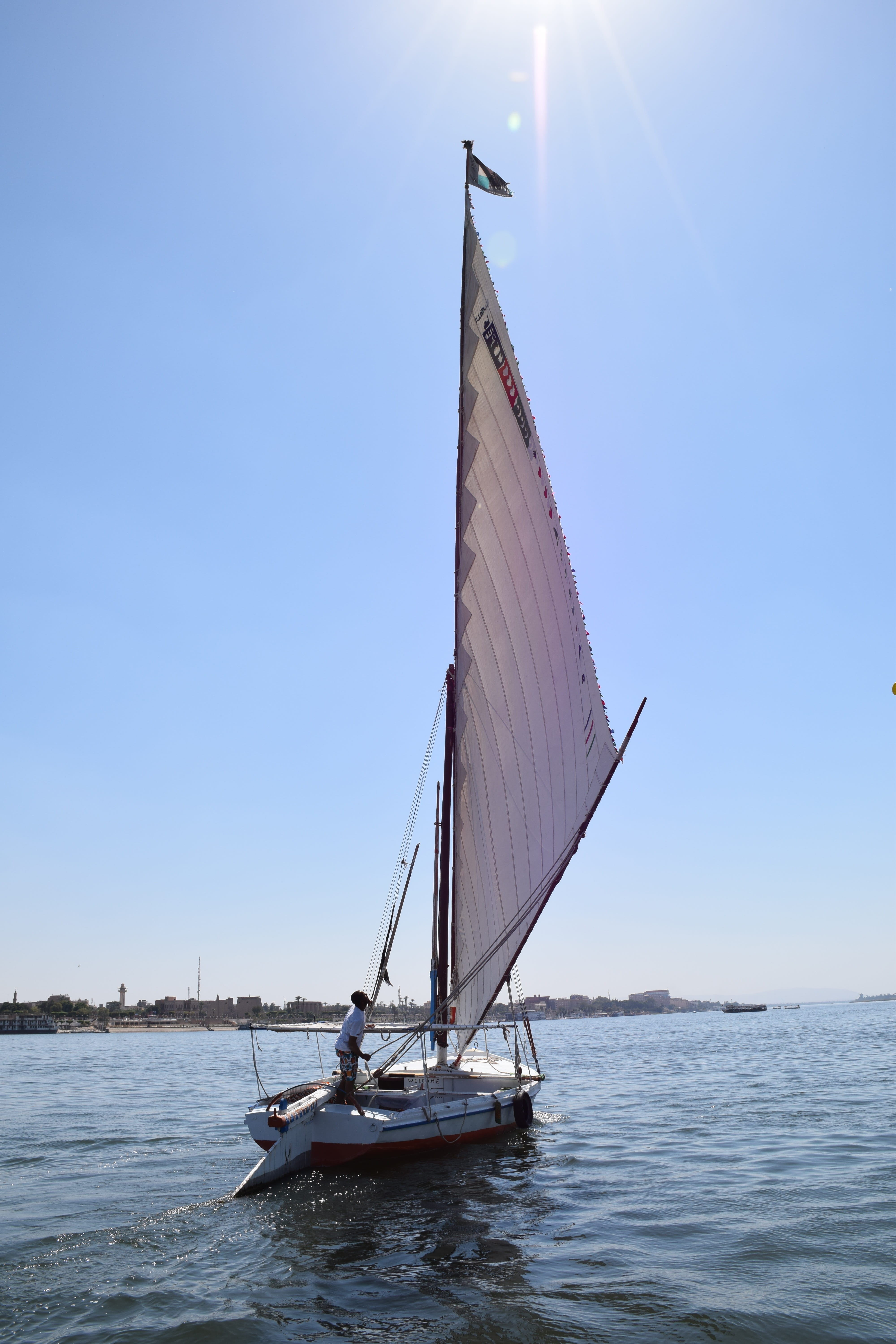 Sun, 5K, sailboat, Felucca, sea, egyptian, river, waterfront, sky, sailing, transportation, summer, Nile, mast, adventure, day, water, nautical vessel, Phone HD Wallpaper