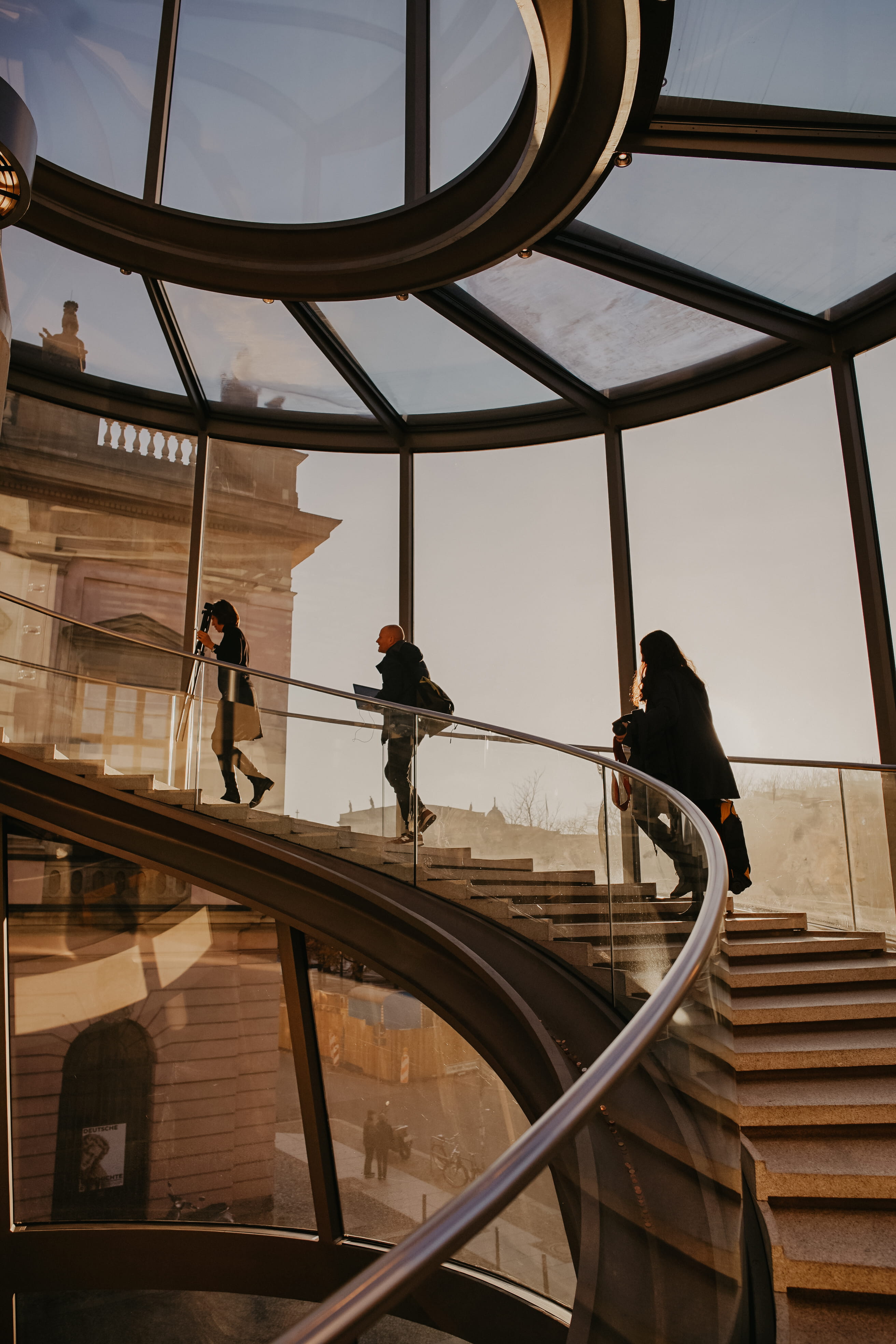 handrail, banister, building, architecture, men, walking, sky, three, 4K, lifestyles, person, pedestrian, people, indoors, wood, flare, railing, window, Phone HD Wallpaper