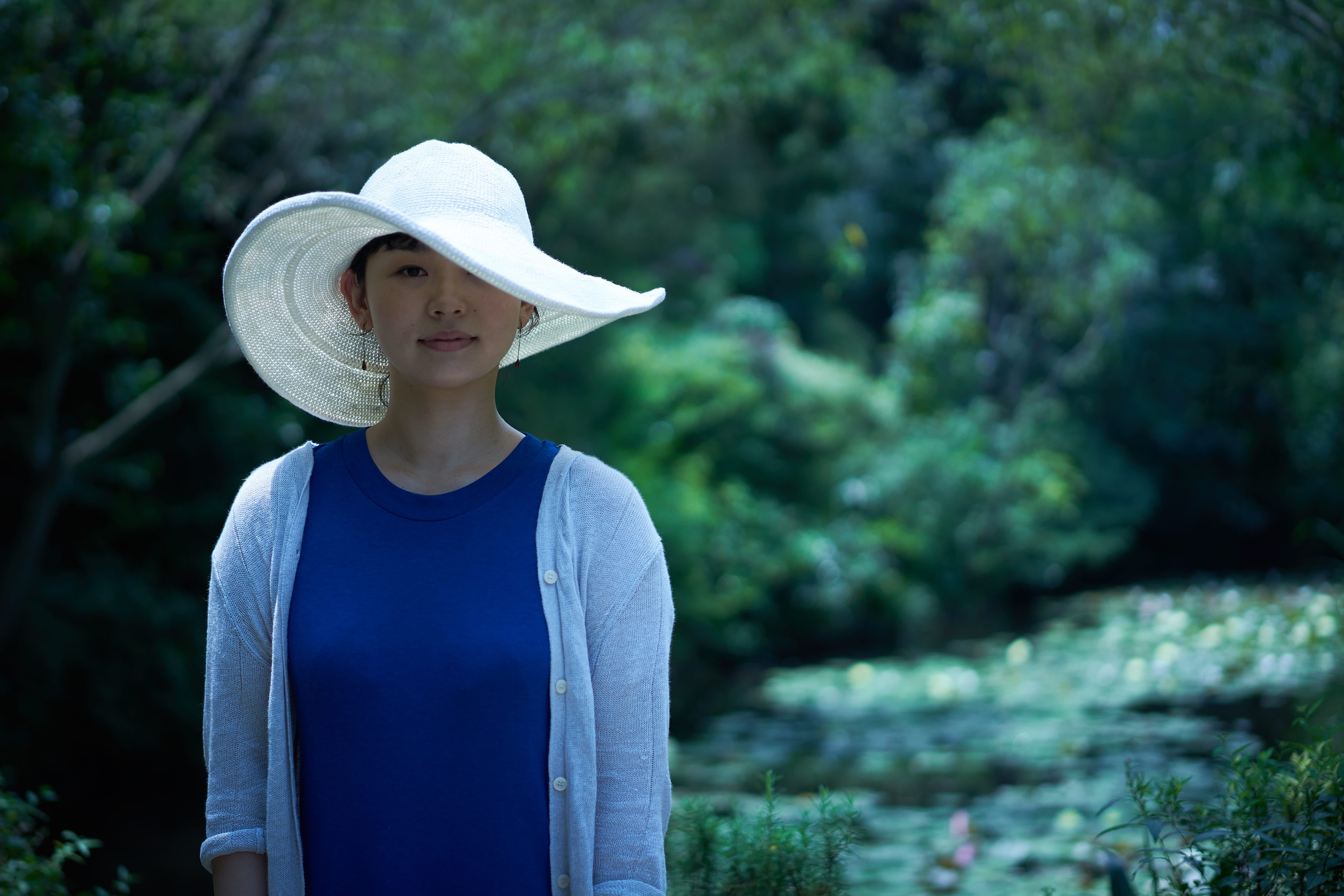 food, cardigan, casual clothing, one person, nature, outdoor, portrait, lifestyles, waist up, tree, 5K, real people, front view, innocence, hat, chichu art museum, HD Wallpaper