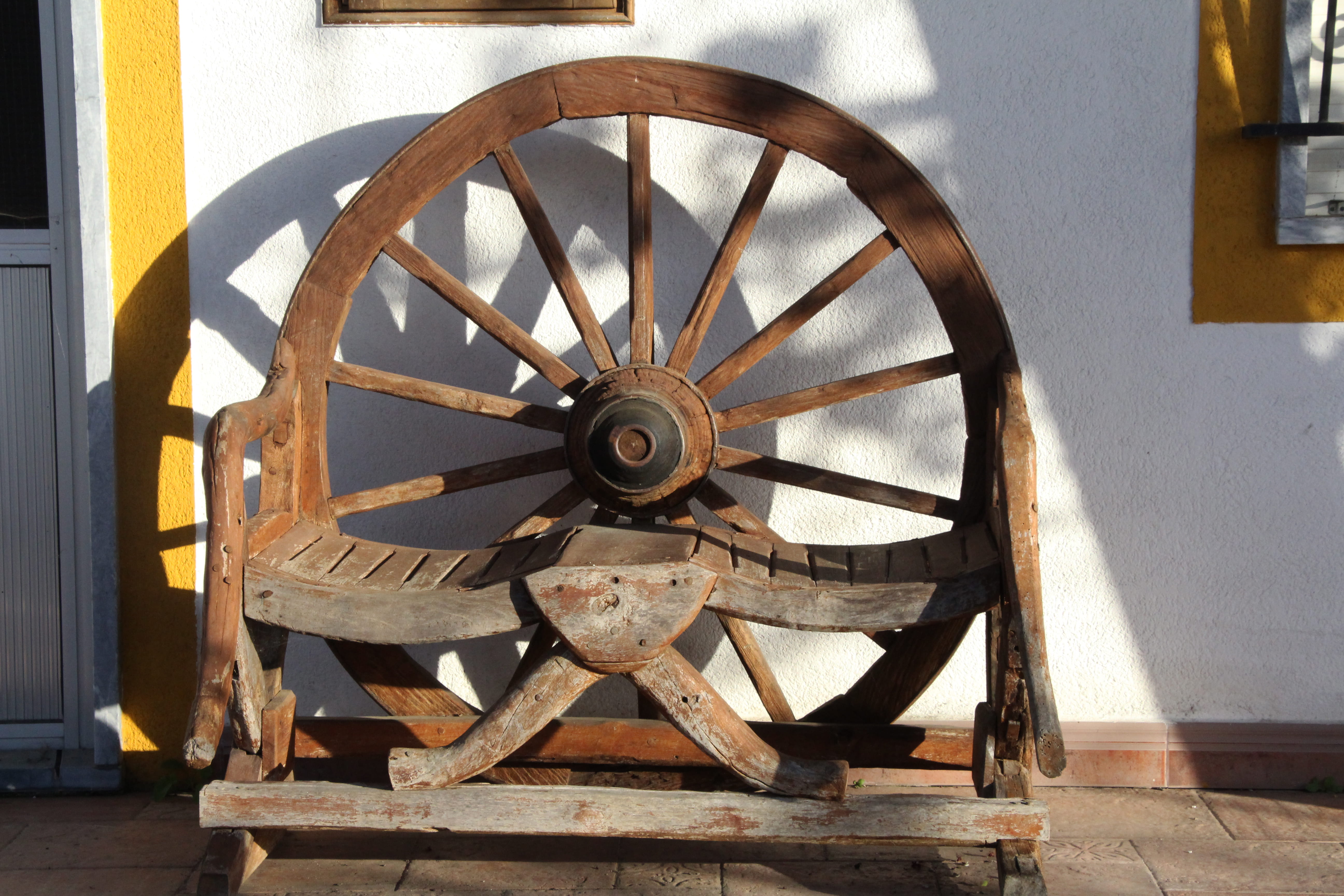 indoors, geometric shape, transportation, sunlight, built structure, évora, architecture, old, day, no people, wagon wheel, portugal, close-up, nature, HD Wallpaper
