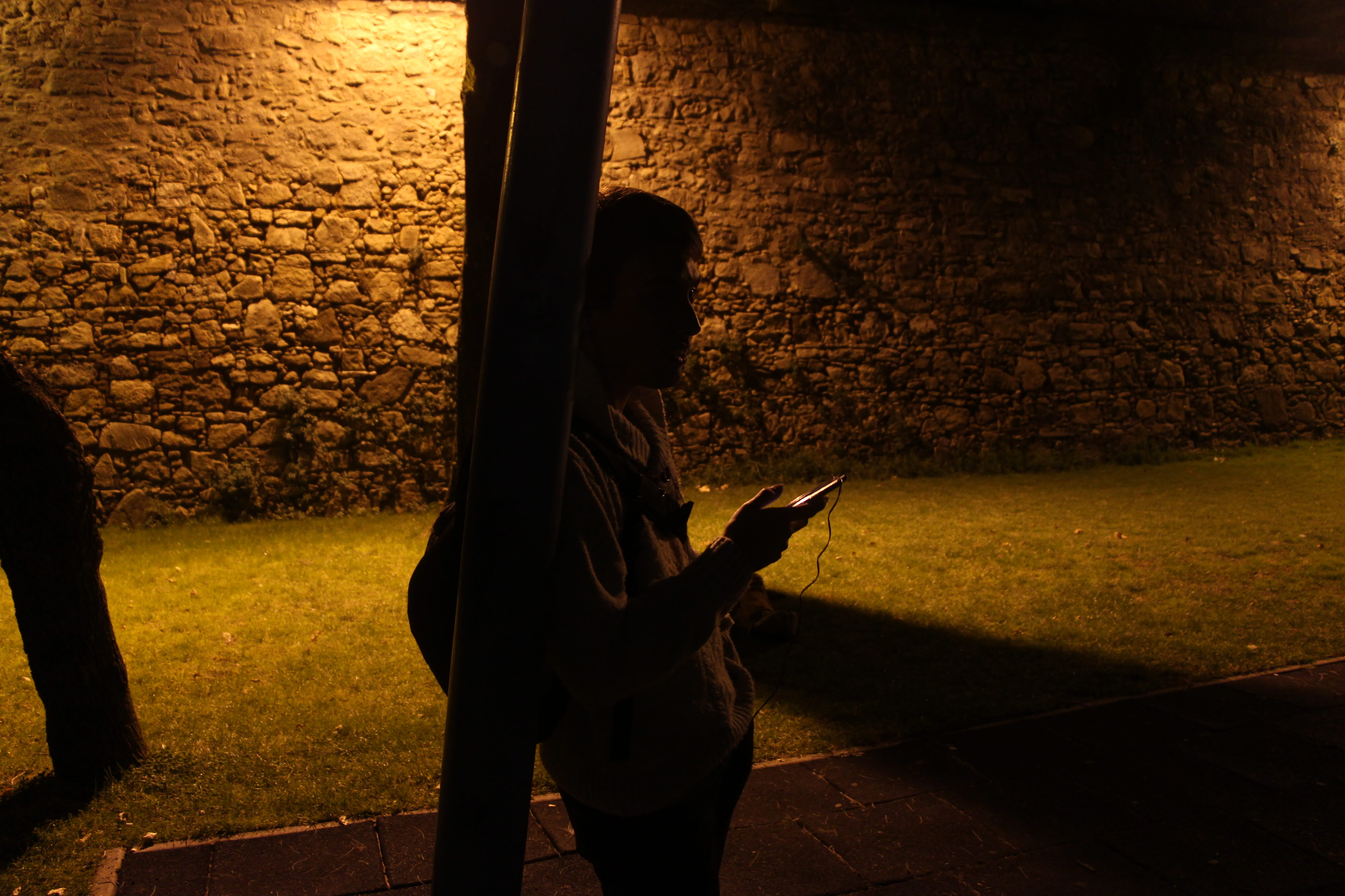 night, architecture, using phone, real people, wall - building feature, standing, connection, technology, three quarter length, smart phone, mobile phone, HD Wallpaper