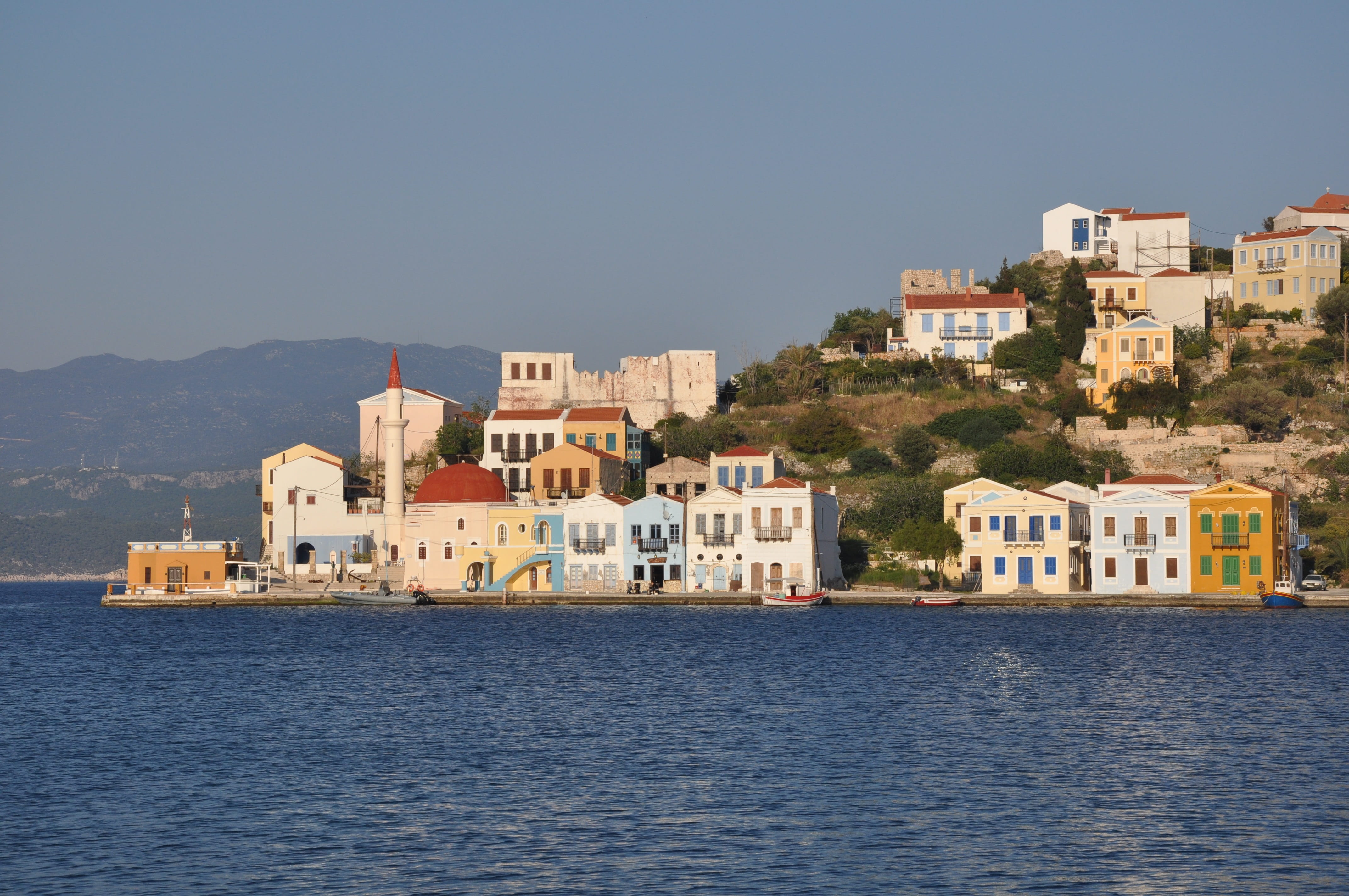 dodecanese, mountain, nature, sea, sunlight, outdoors, Waterfront, day, travel destinations, clear sky, europe, Kastelorizo, land, Greece, water, residential district, HD Wallpaper
