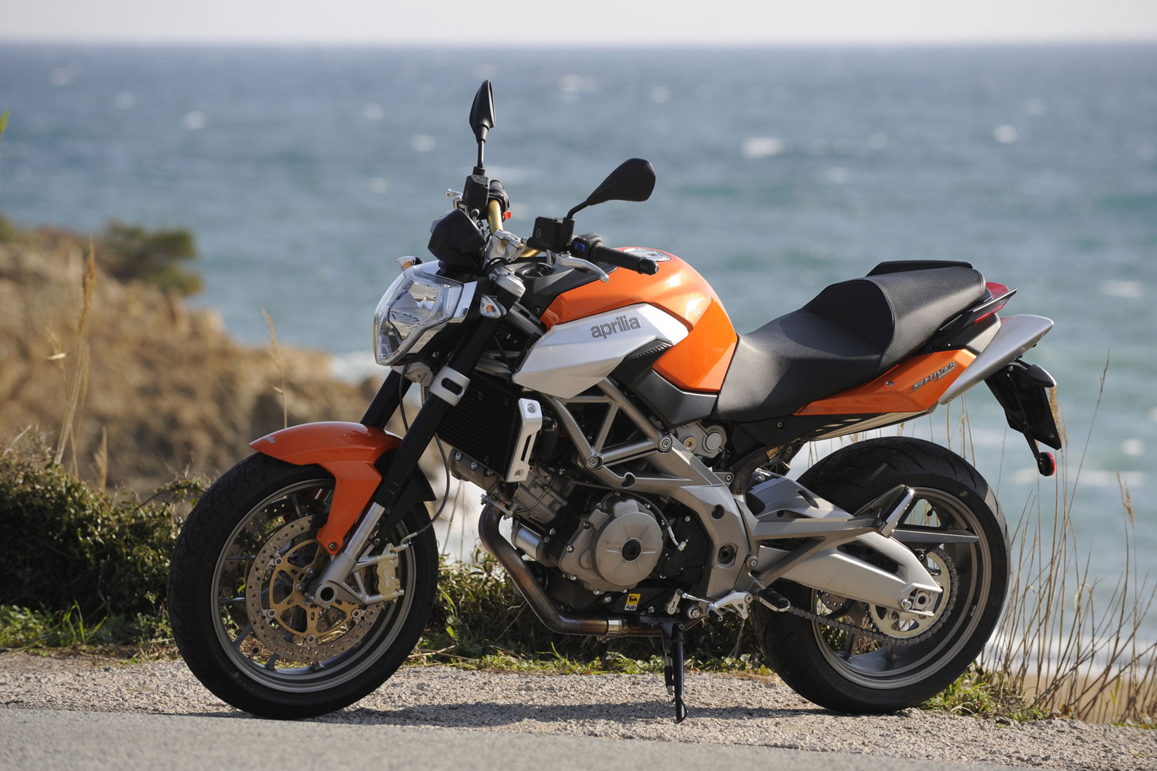720P, helmet, shiver, land vehicle, land, real people, day, motorcycle, one person, aprilia, beach, crash helmet, scenics - nature, wheel, beauty in nature, HD Wallpaper
