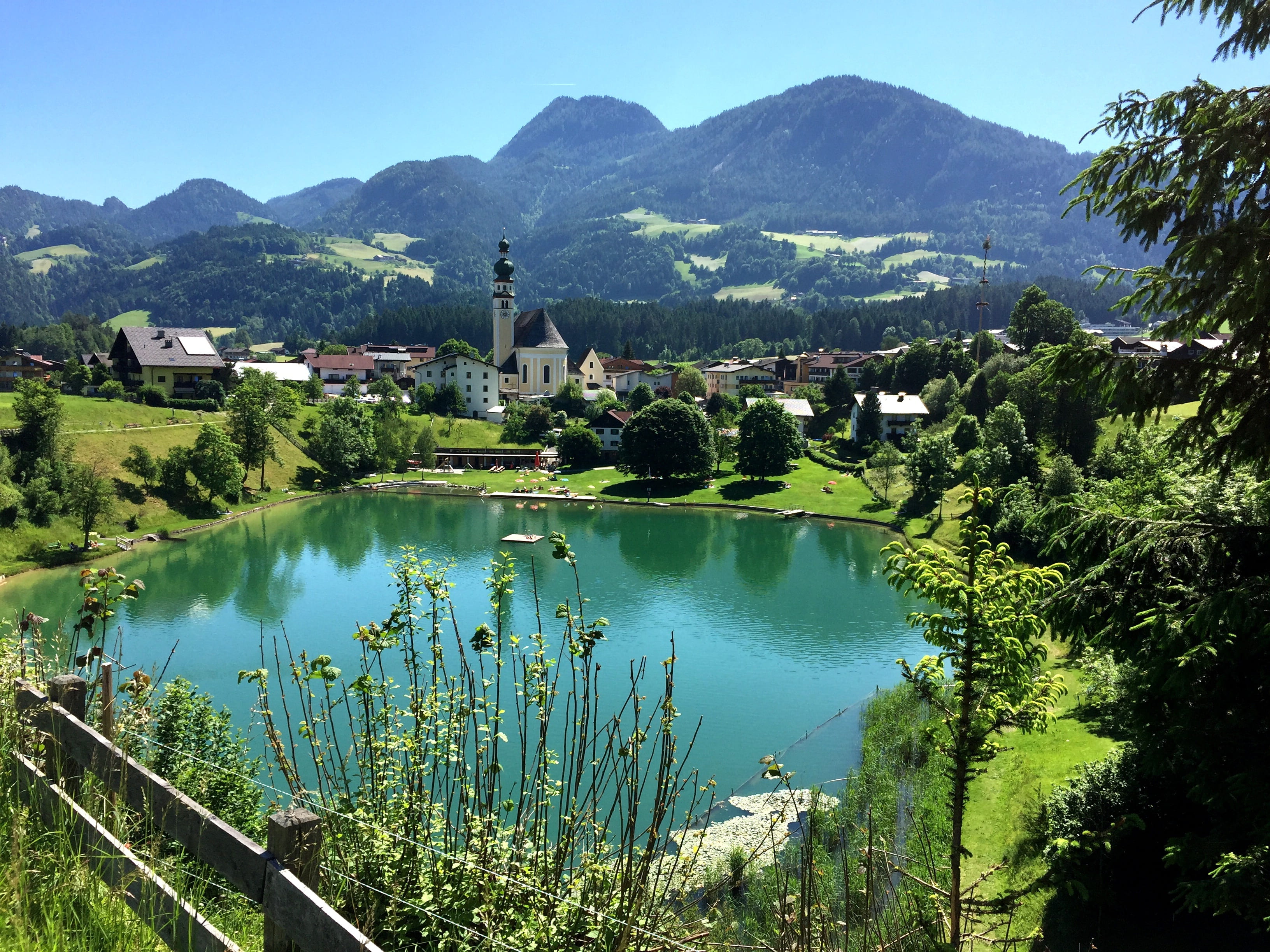 reflection, reither lake, tree, mountains, village, building, church, mountain range, beauty in nature, 2K, scenics - nature, kufstein country, steeple, HD Wallpaper