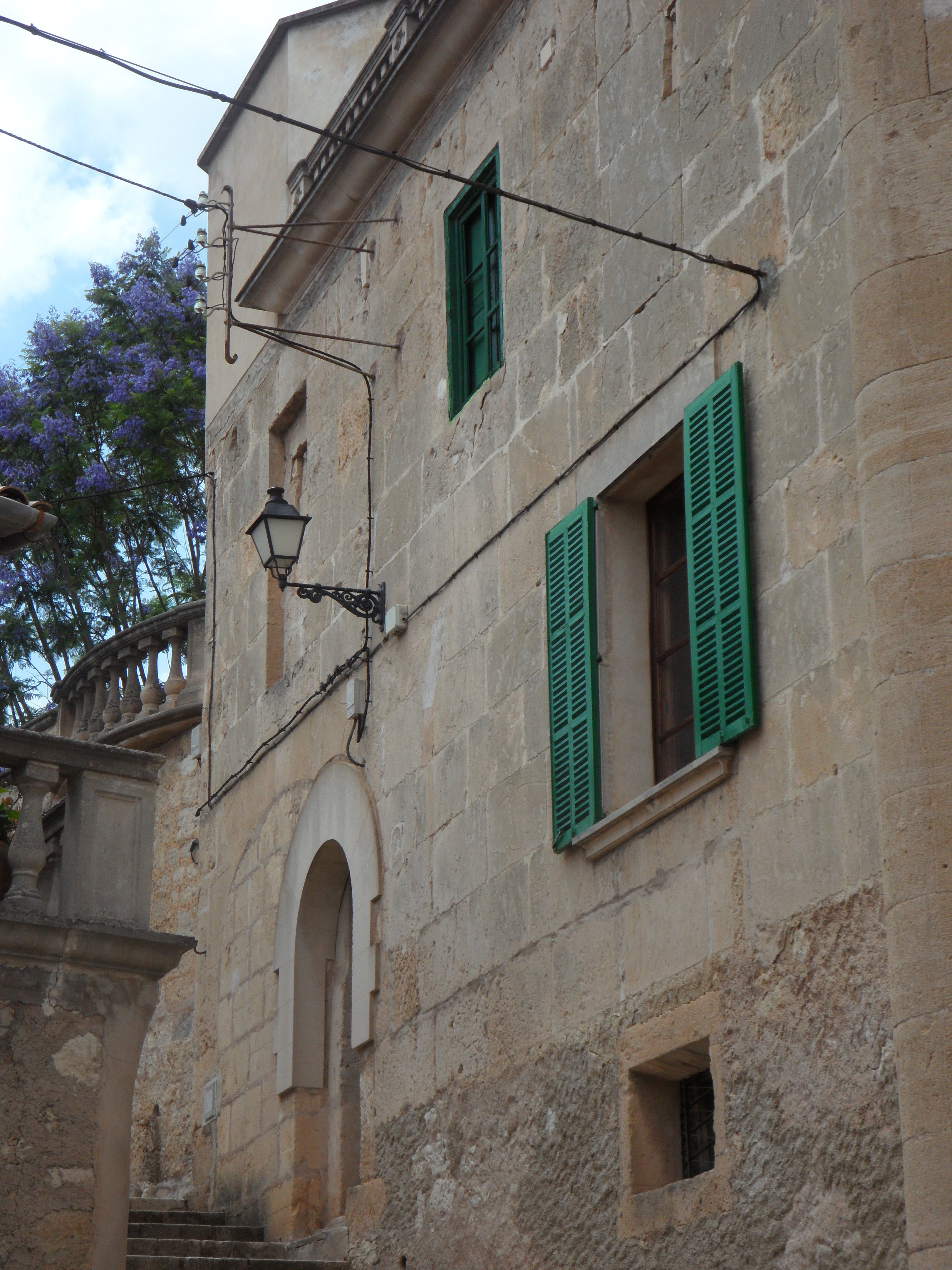 sign, residential district, low angle view, lighting equipment, arch, spain, tree, home, village, old town, summer house, religion, window, wall, day, no people, Phone HD Wallpaper
