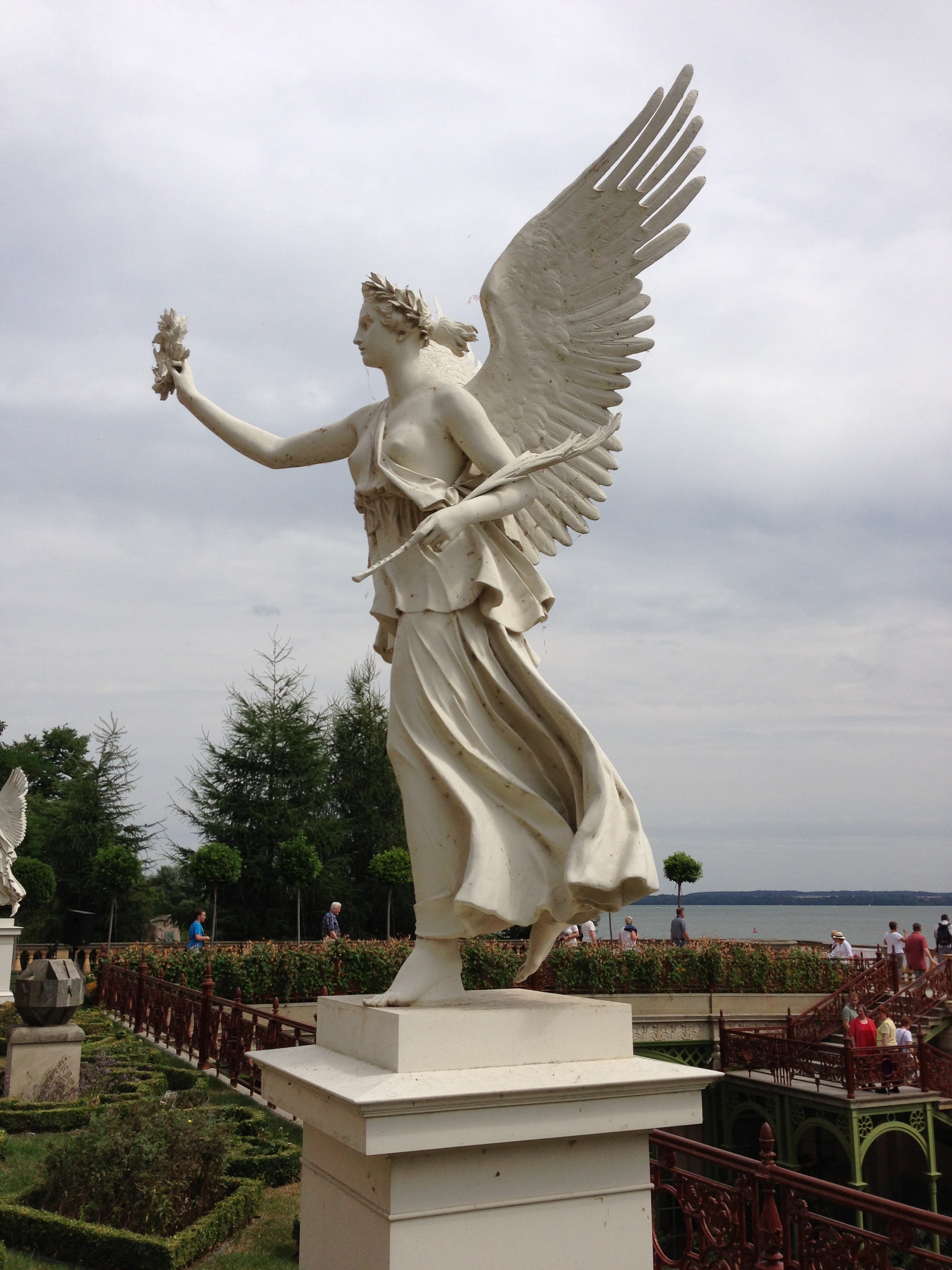 nature, female likeness, representation, water, state capital, male likeness, castle, day, art and craft, craft, angel, statue, no people, cloud - sky, Phone HD Wallpaper
