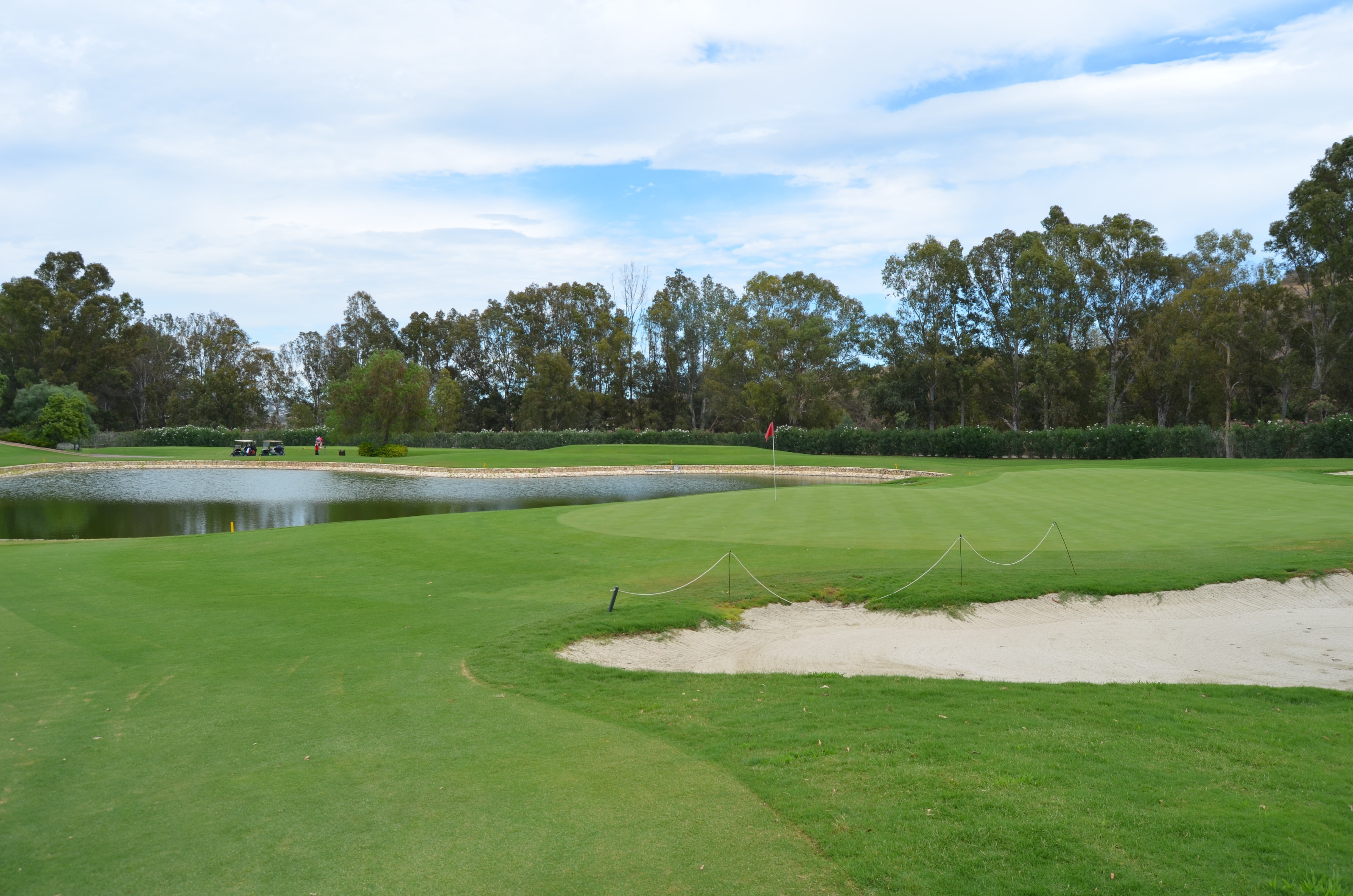 cloud - sky, marbella, grass, activity, beauty in nature, pond, green color, no people, sport, plant, day, tranquil scene, water, green - golf course, leisure activity, HD Wallpaper