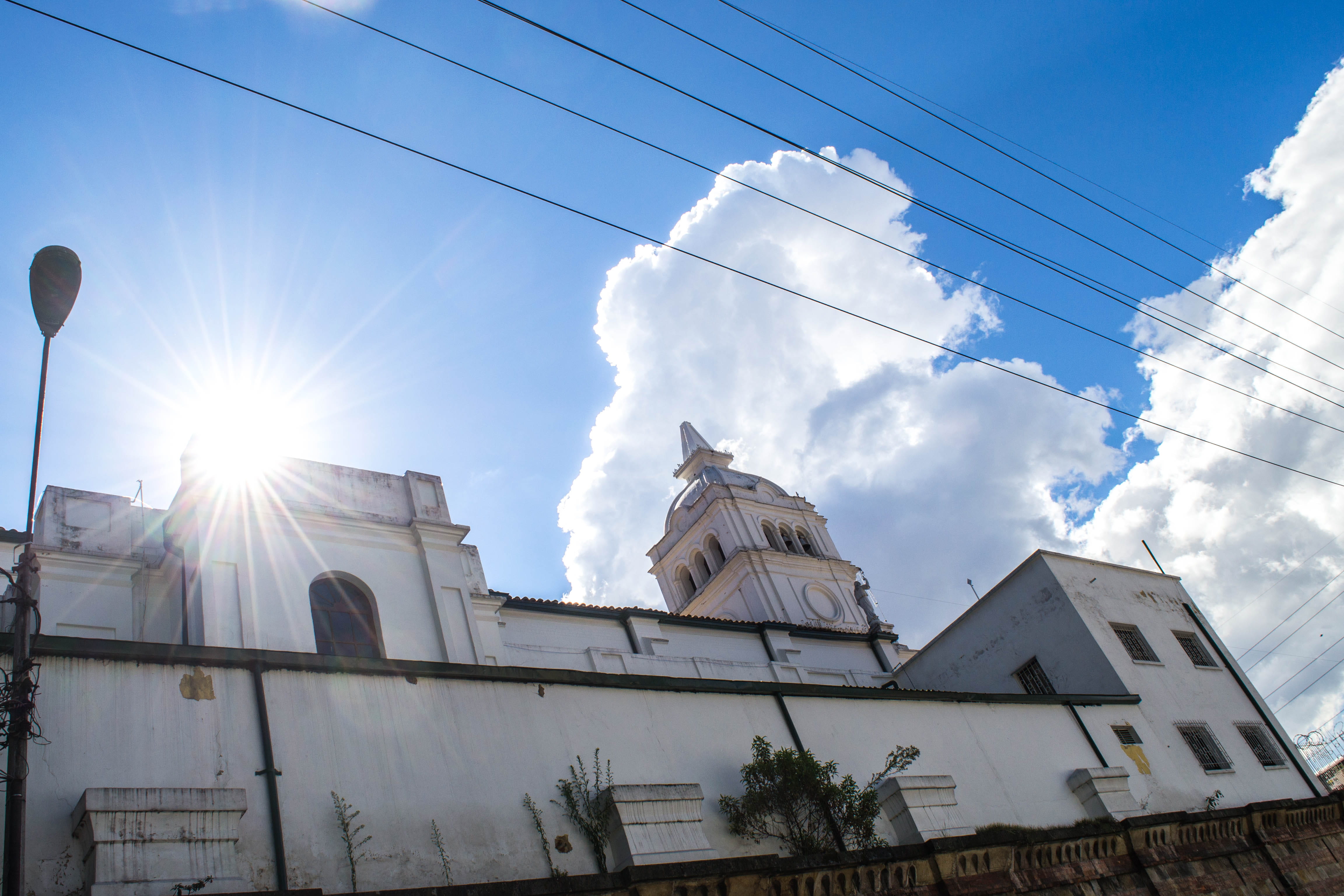 outdoors, spire, iglesia, bogota, city, architecture, weather, flare, day, building exterior, cable, low angle view, tower, built structure, lens flare, HD Wallpaper
