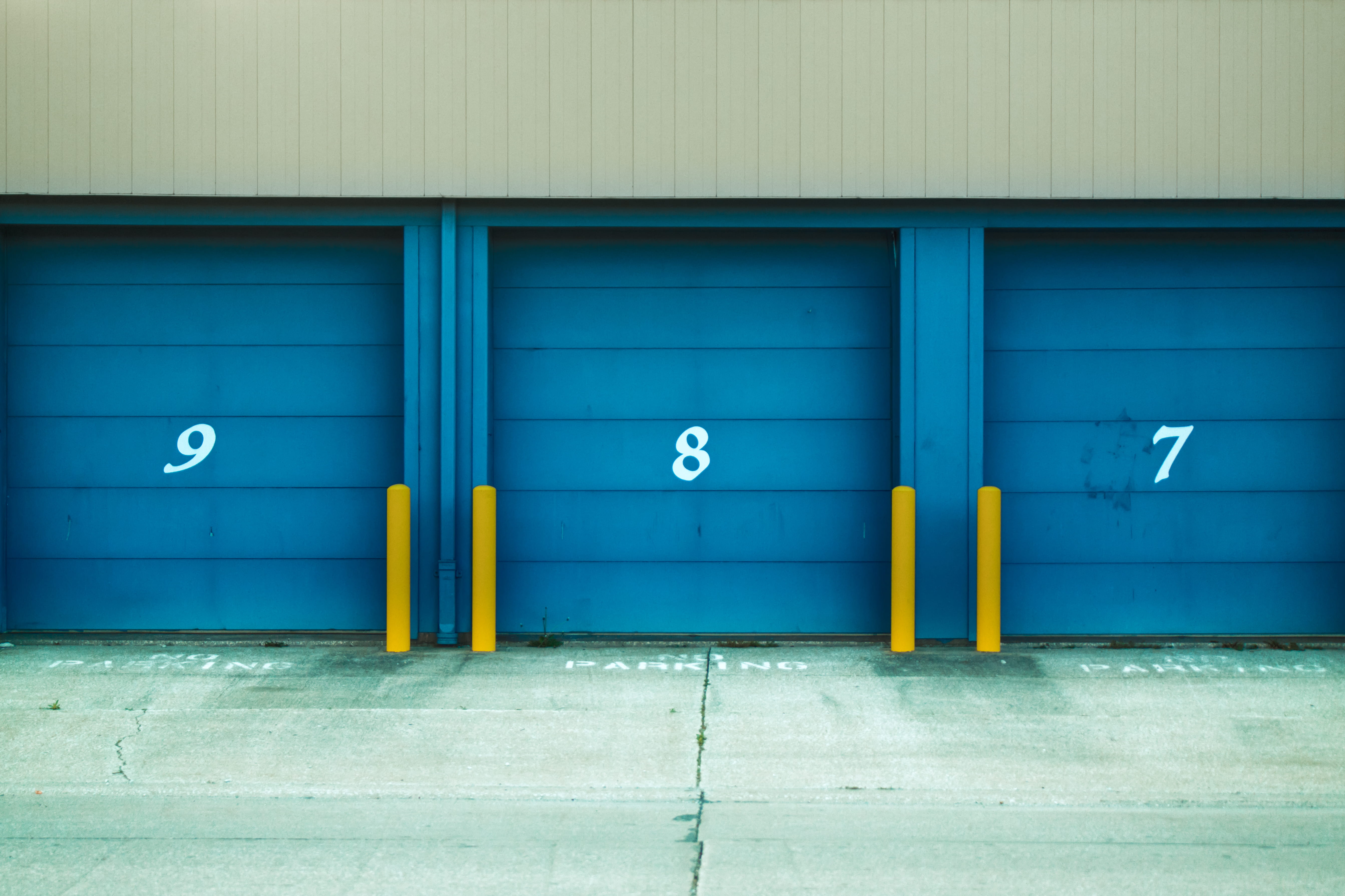 built structure, three, wall - building feature, door, yellow, roller, 8, sign, blue, daytime, closed, 9, shutters, 5K, building, day, typography, communication, HD Wallpaper