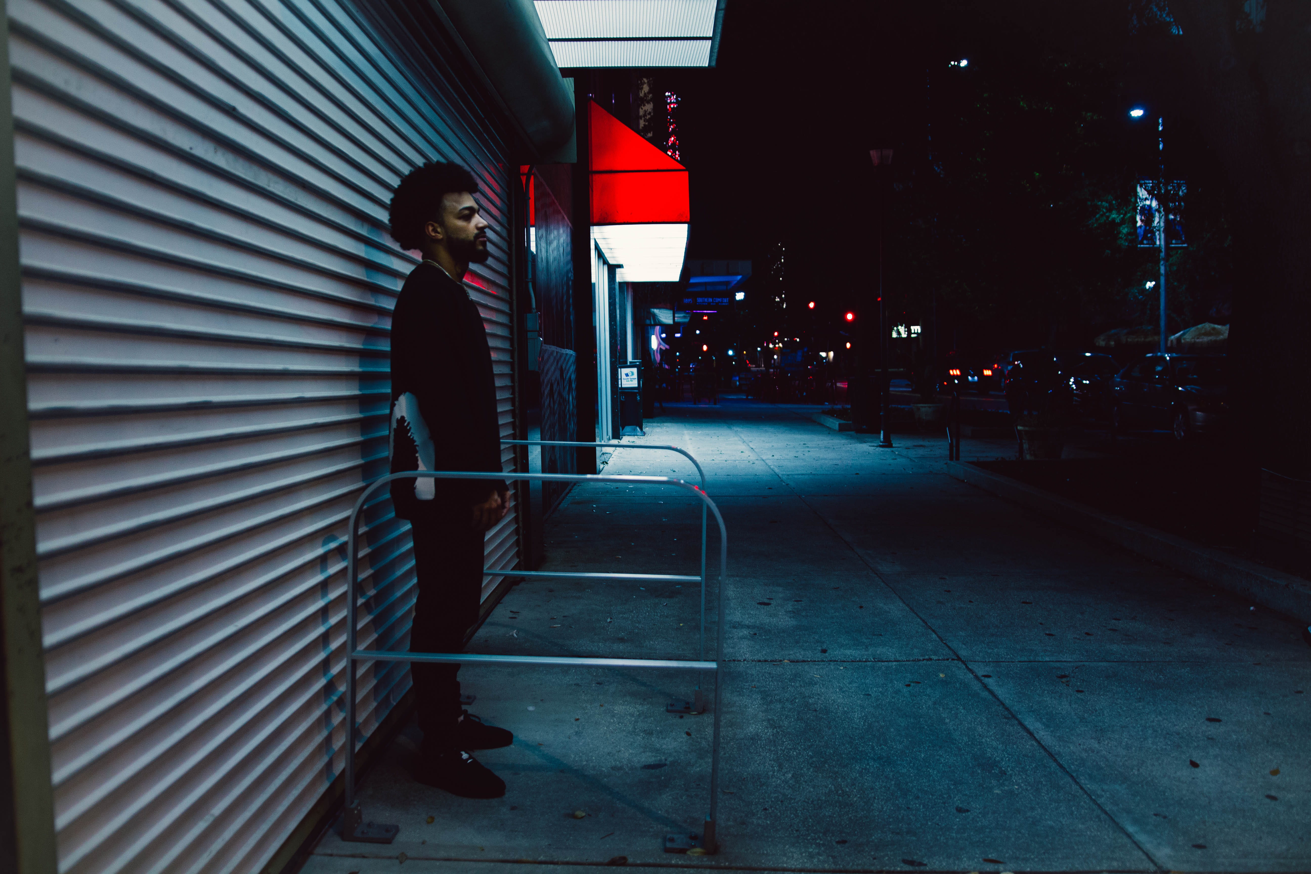 young adult, night, illuminated, built structure, young men, lifestyles, building exterior, side view, city life, roller, adult, man, behind, contemplation, HD Wallpaper
